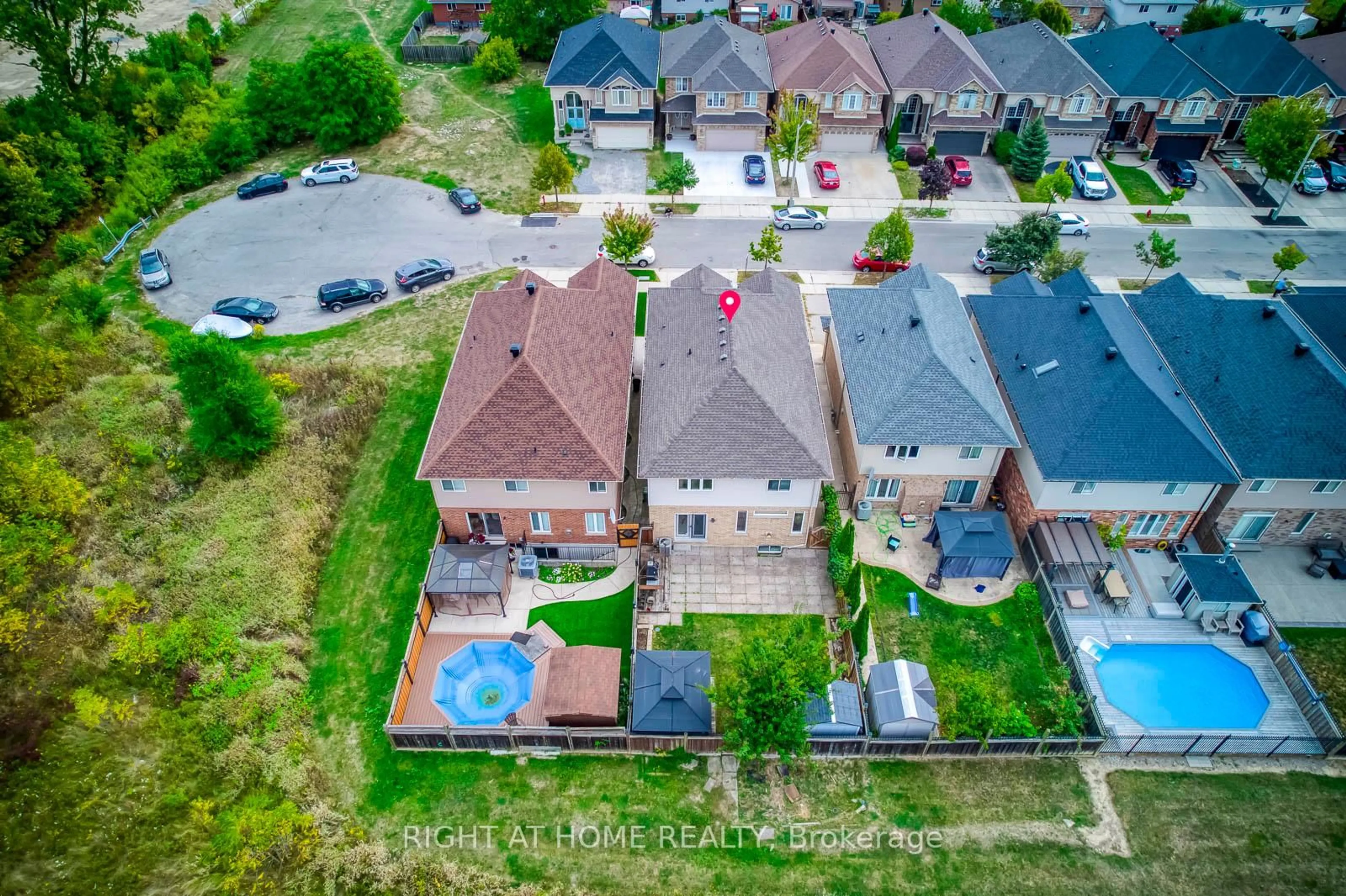A pic from outside/outdoor area/front of a property/back of a property/a pic from drone, street for 38 Assisi St, Hamilton Ontario L8W 0A5