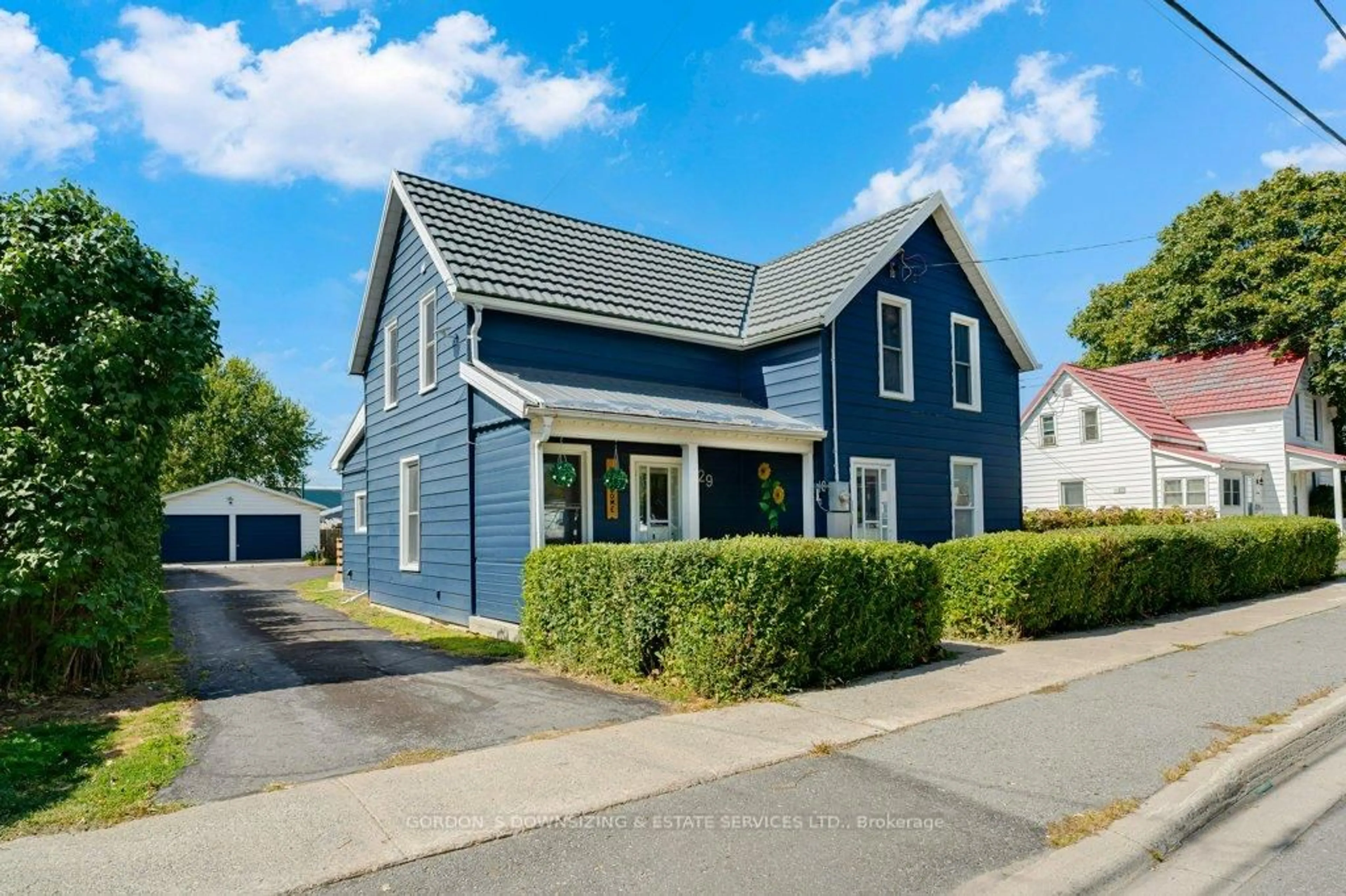 Home with vinyl exterior material, street for 29 Factory St, Bissett Creek Ontario K0H 2H0