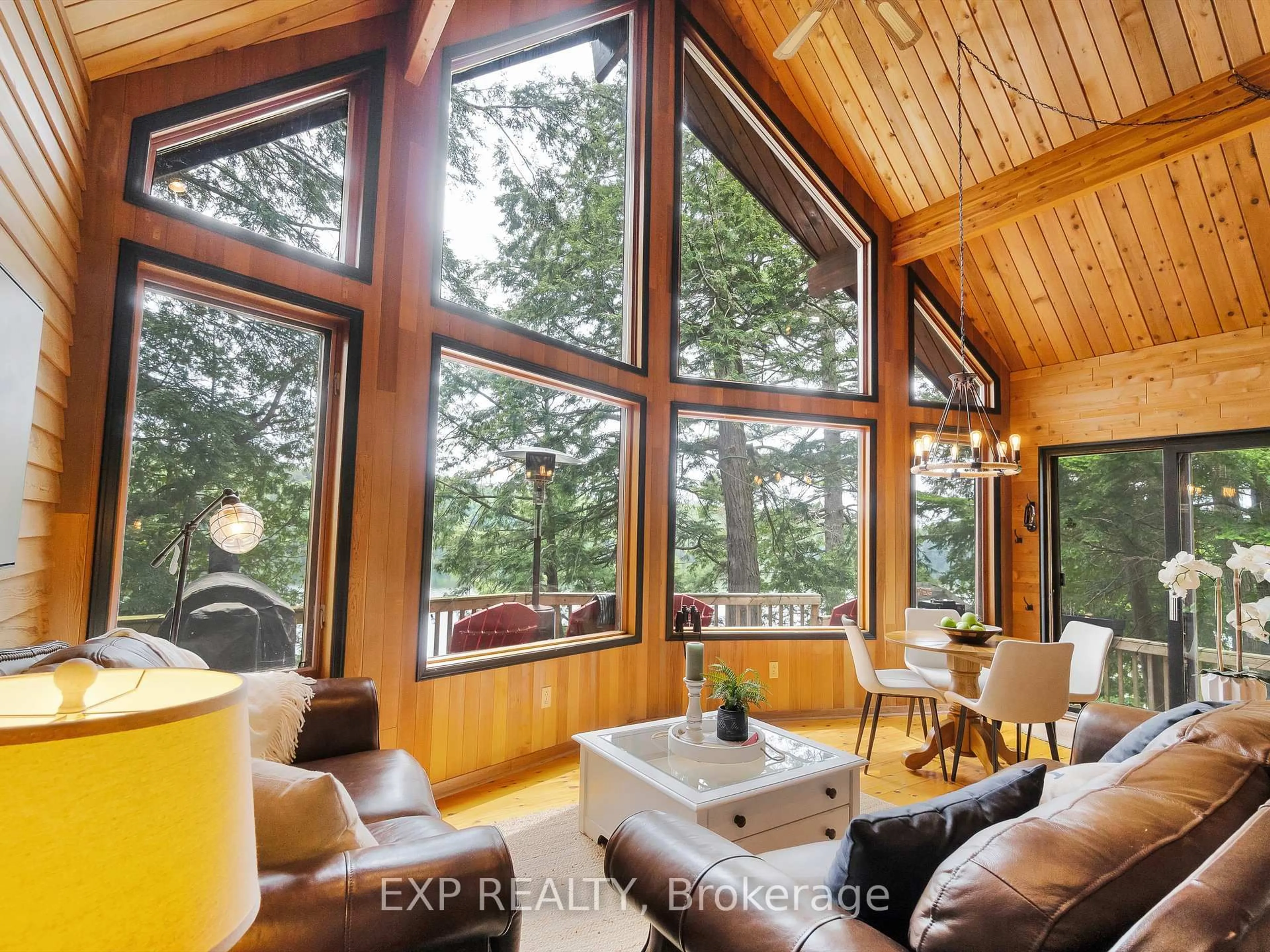 Living room with furniture, wood/laminate floor for 230 Doe Lake Peninsula, Armour Ontario P0A 1L0