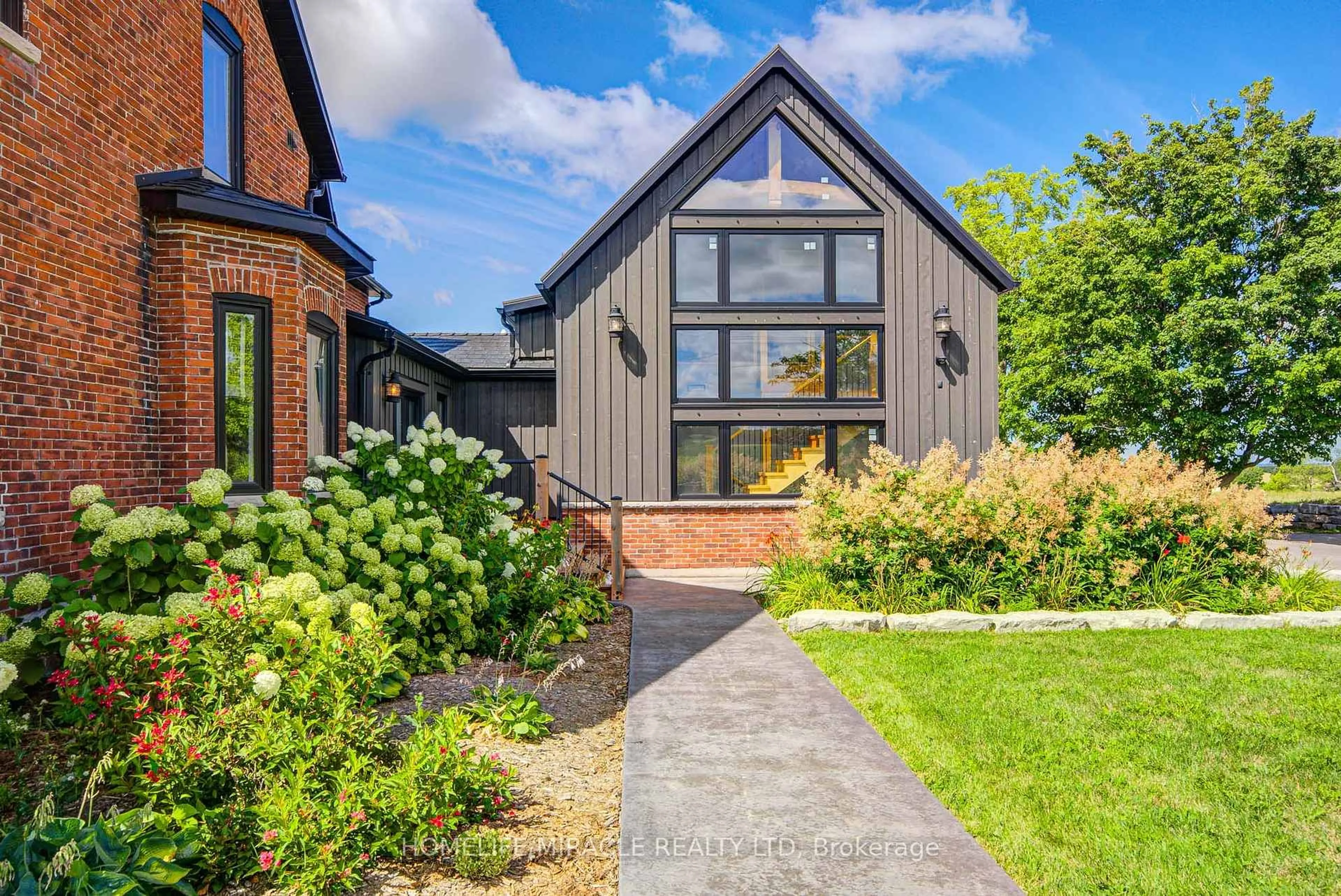 Home with brick exterior material, street for 9214 Oak Ridges Dr, Hamilton Township Ontario K0K 2E0