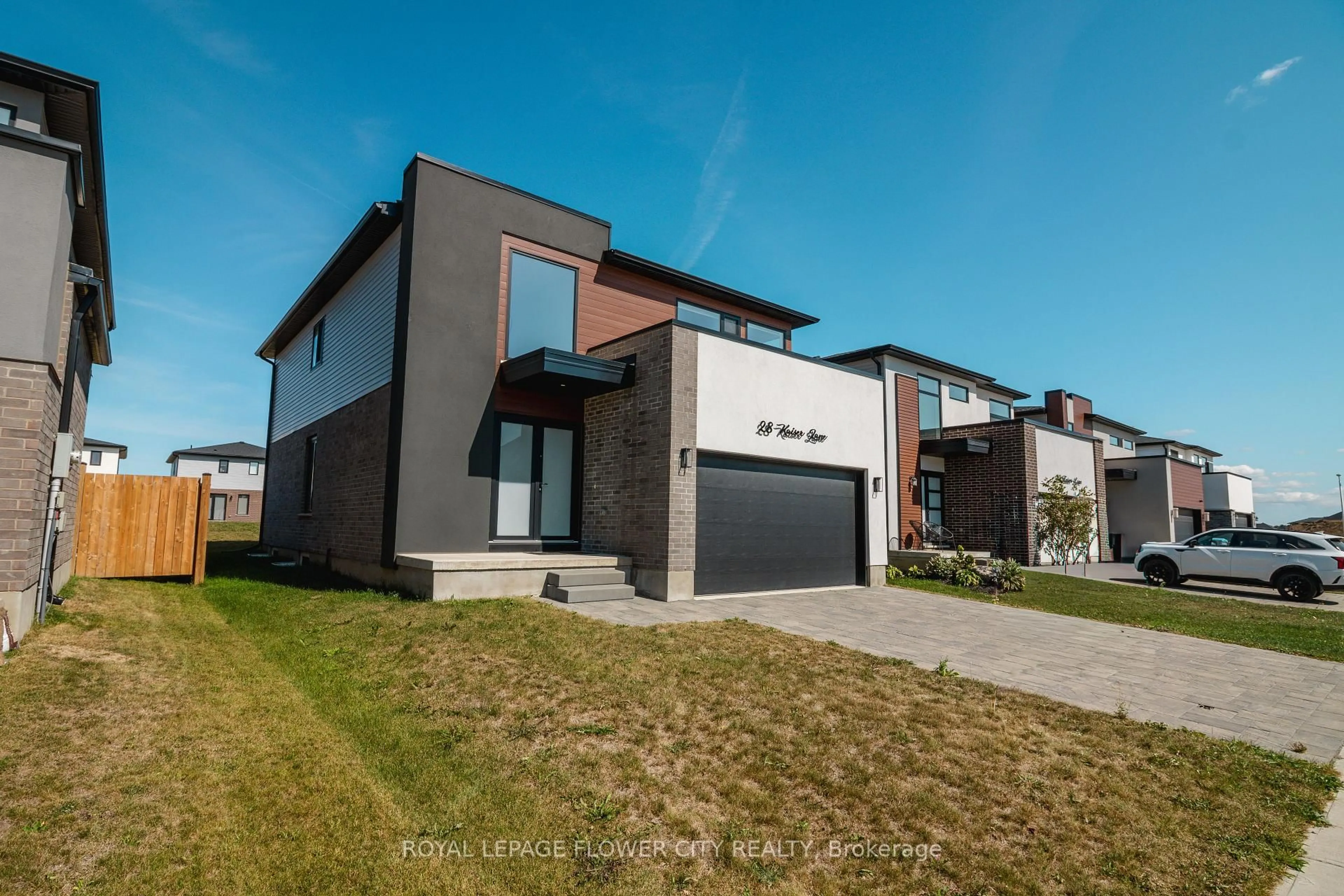 Home with brick exterior material, street for 28 Kaiser Lane, Middlesex Centre Ontario N0L 1R0