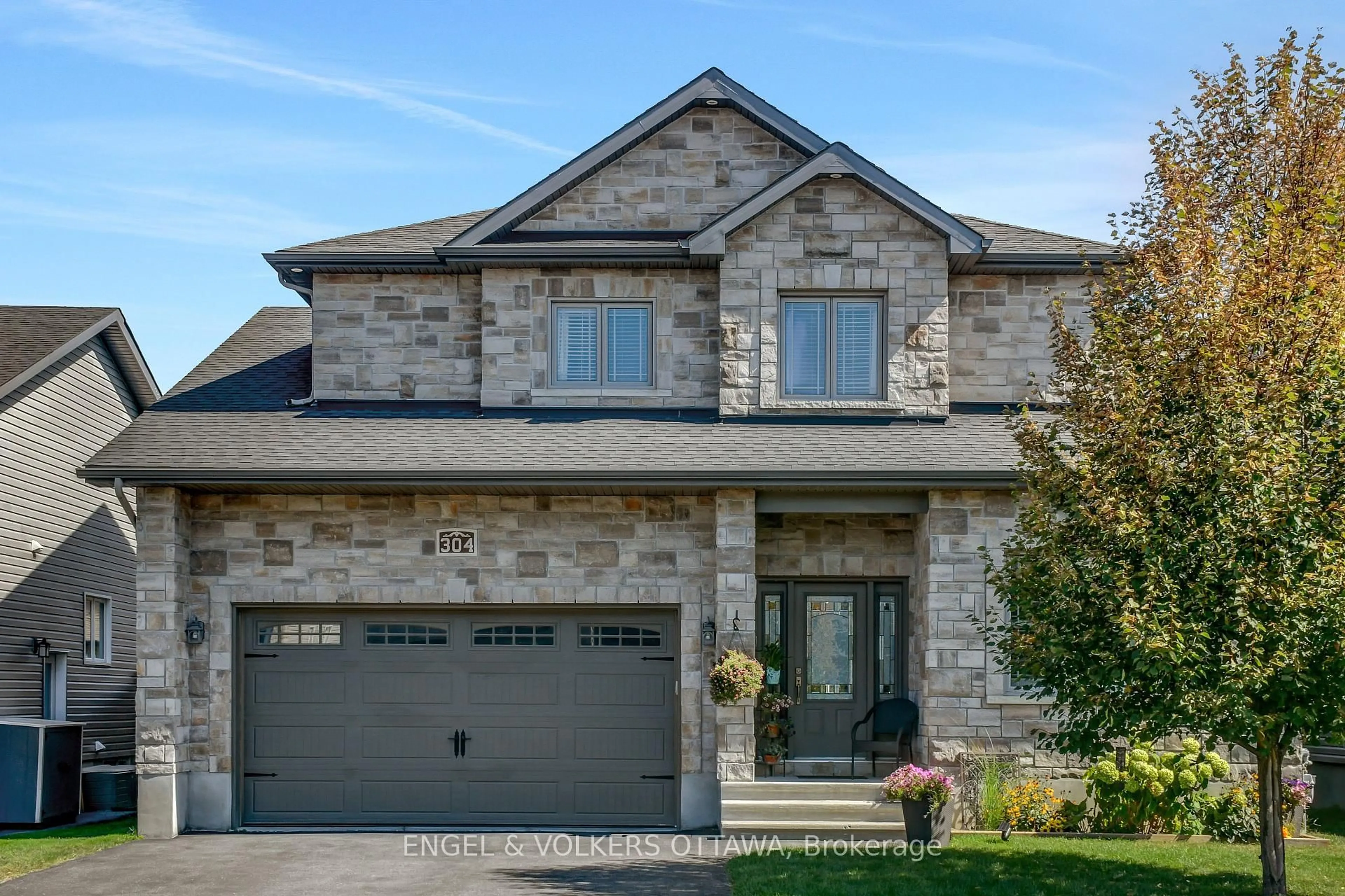 Home with brick exterior material, street for 304 Colmar St, Russell Ontario K0A 1W0