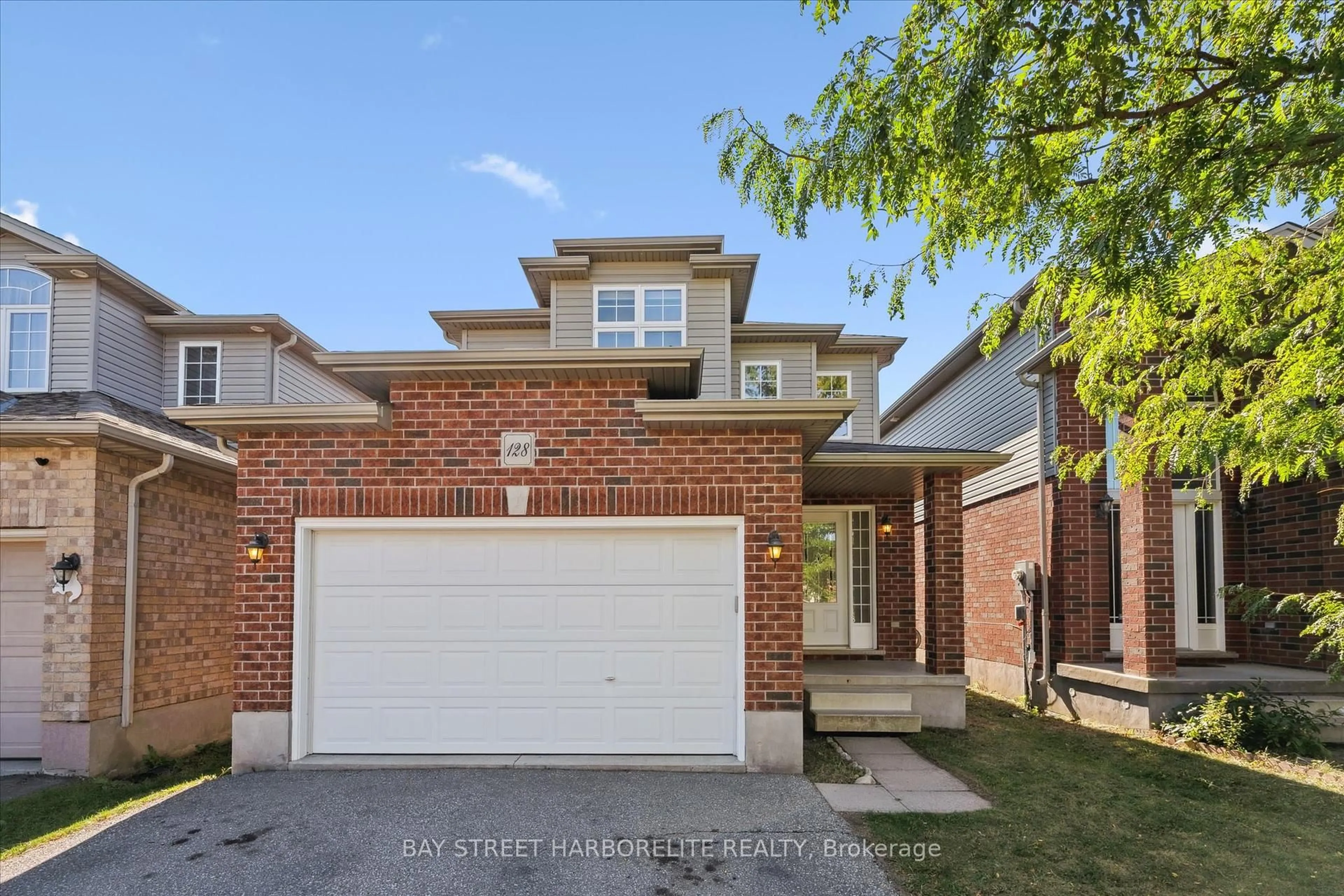 Home with brick exterior material, street for 128 CLOUGH Cres, Guelph Ontario N1L 0E4