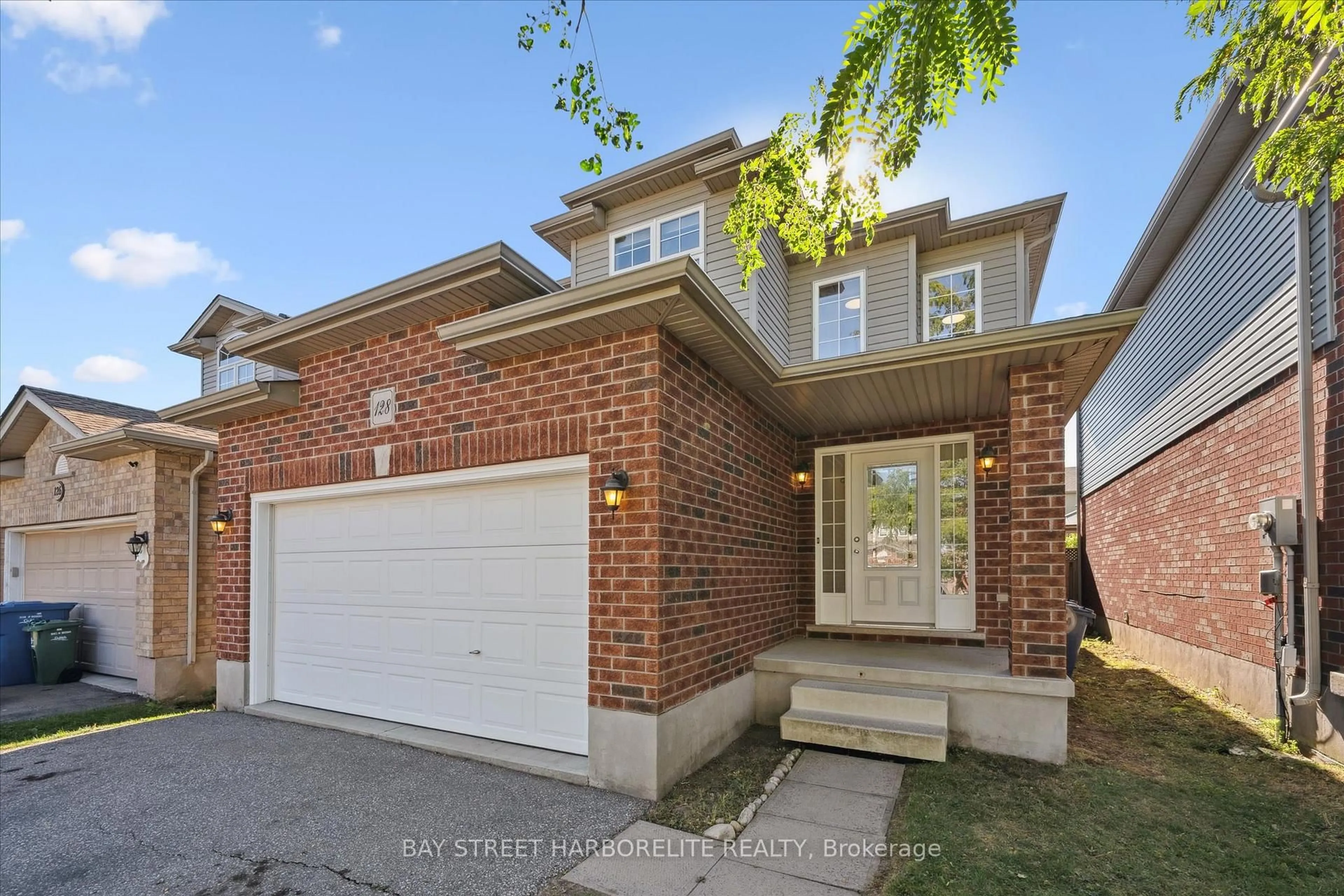 Home with brick exterior material, street for 128 CLOUGH Cres, Guelph Ontario N1L 0E4