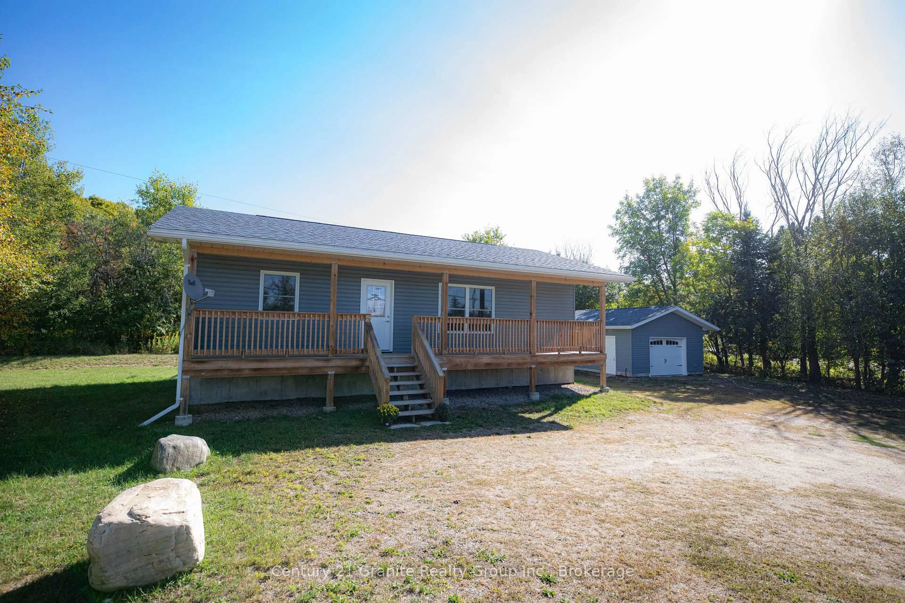 A pic from outside/outdoor area/front of a property/back of a property/a pic from drone, building for 1160 Kennisis Lake Rd, Dysart et al Ontario K0M 1S0