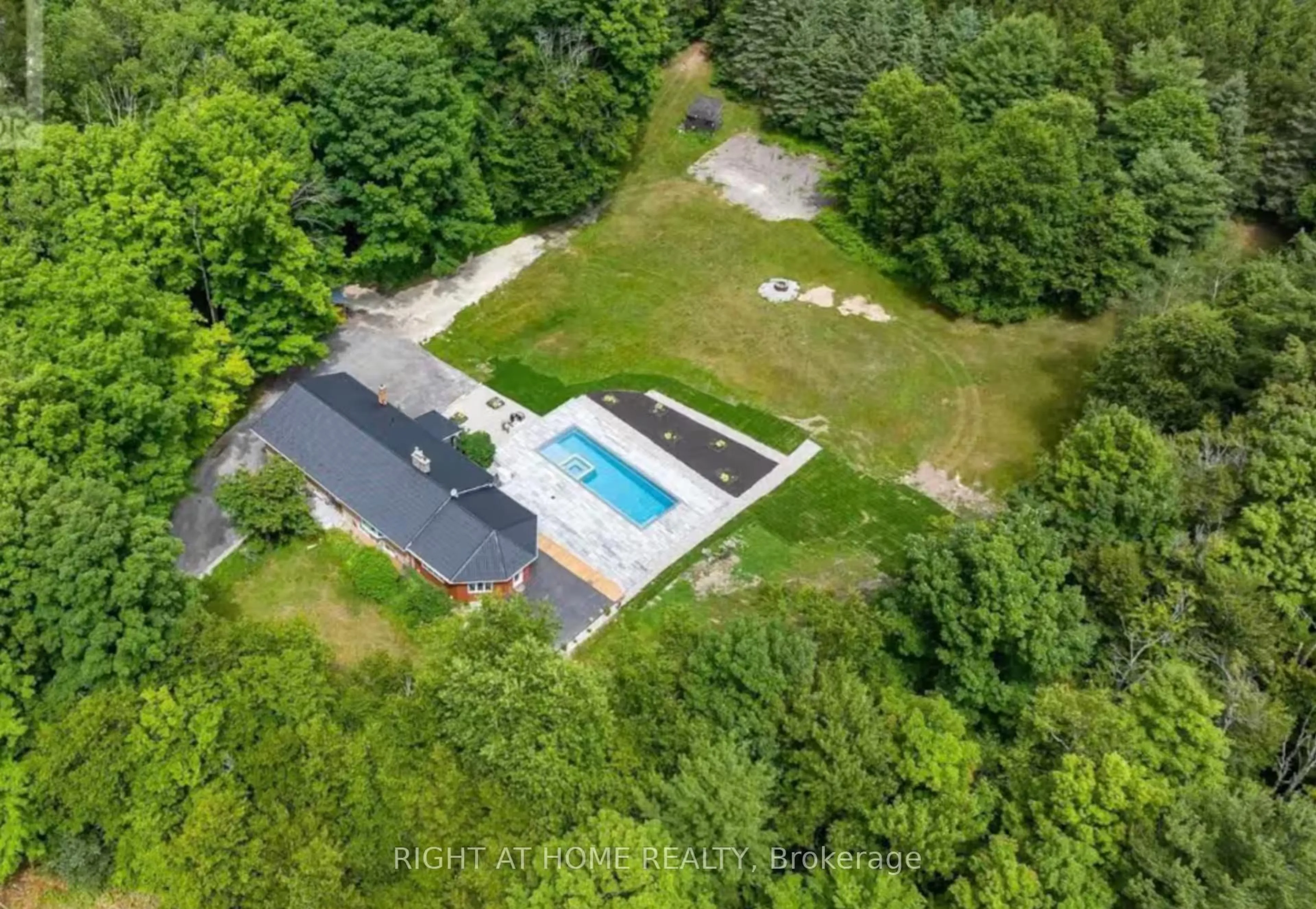 A pic from outside/outdoor area/front of a property/back of a property/a pic from drone, unknown for 938335 Airport Rd, Mulmur Ontario L0N 1M0