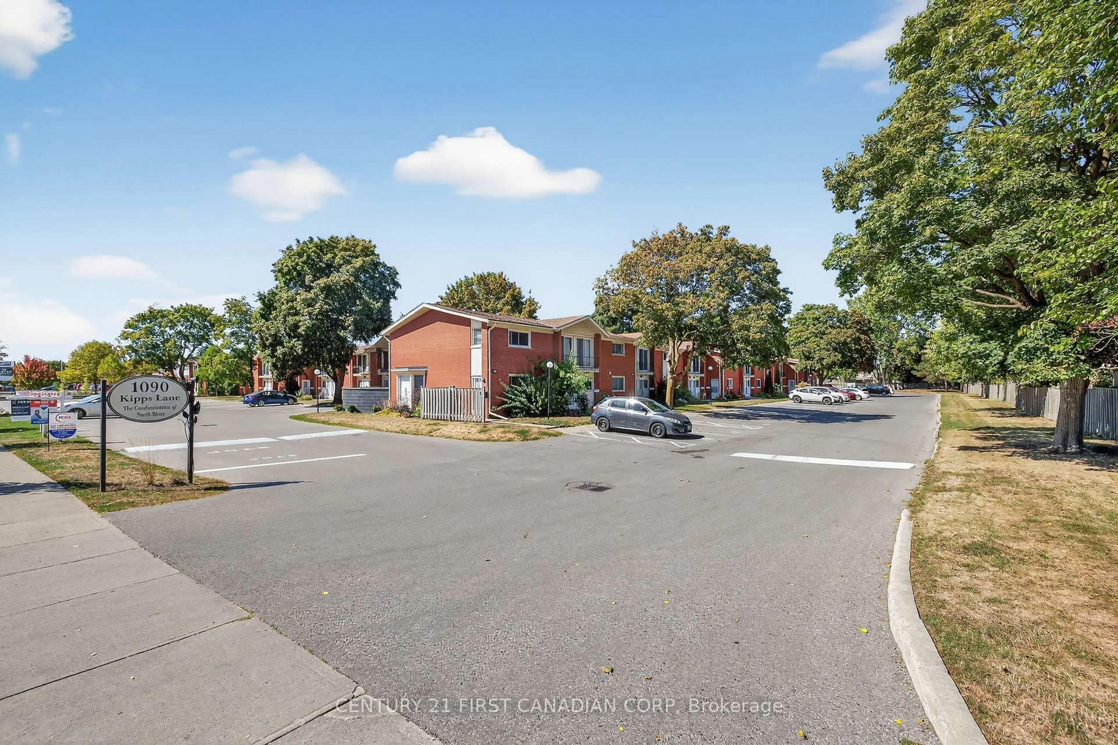 A pic from outside/outdoor area/front of a property/back of a property/a pic from drone, street for 1090 Kipps Lane #102, London East Ontario N5Y 1V4