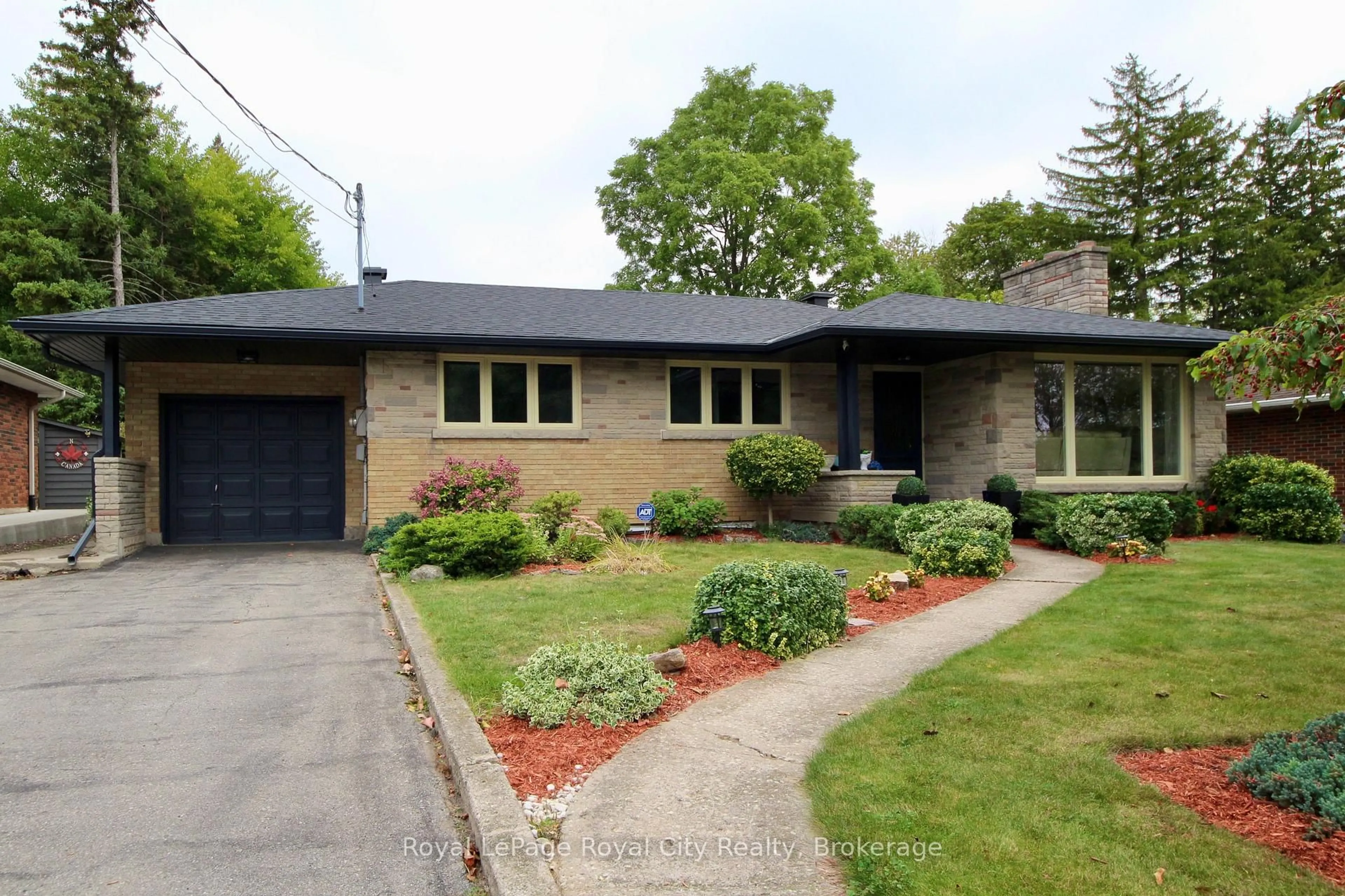 Home with brick exterior material, street for 133 Westmount Rd, Guelph Ontario N1H 5J3