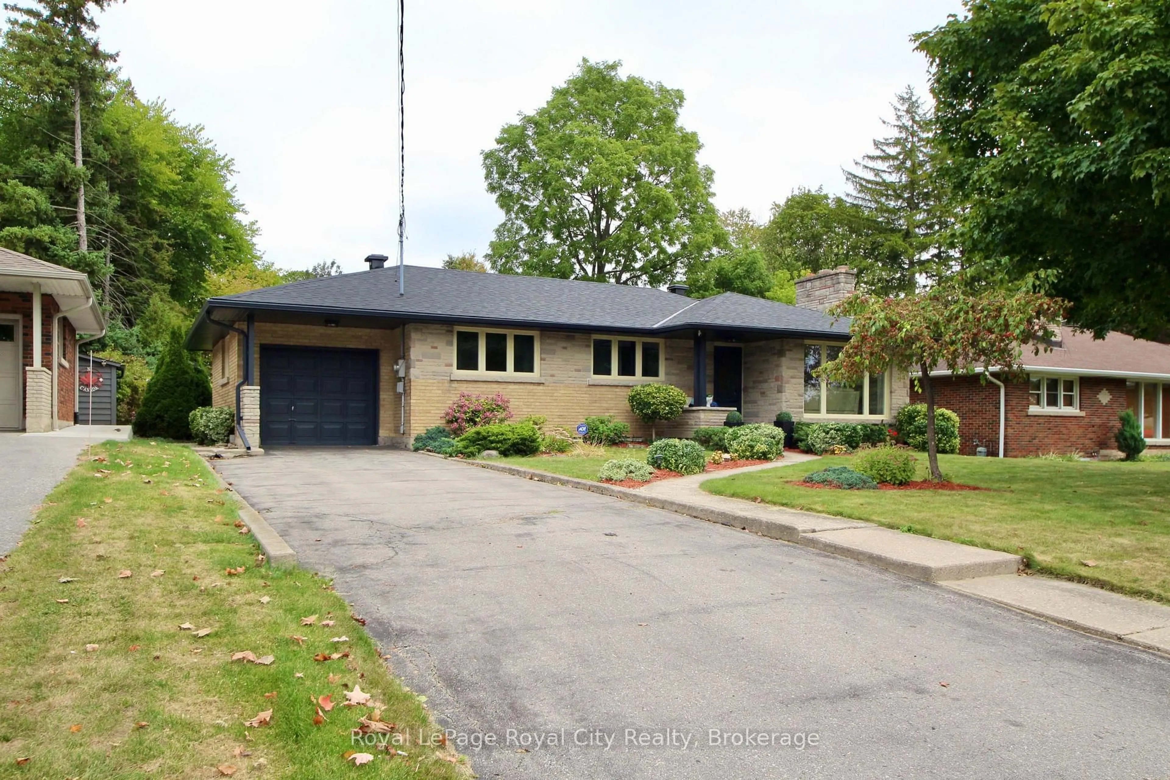Home with brick exterior material, street for 133 Westmount Rd, Guelph Ontario N1H 5J3