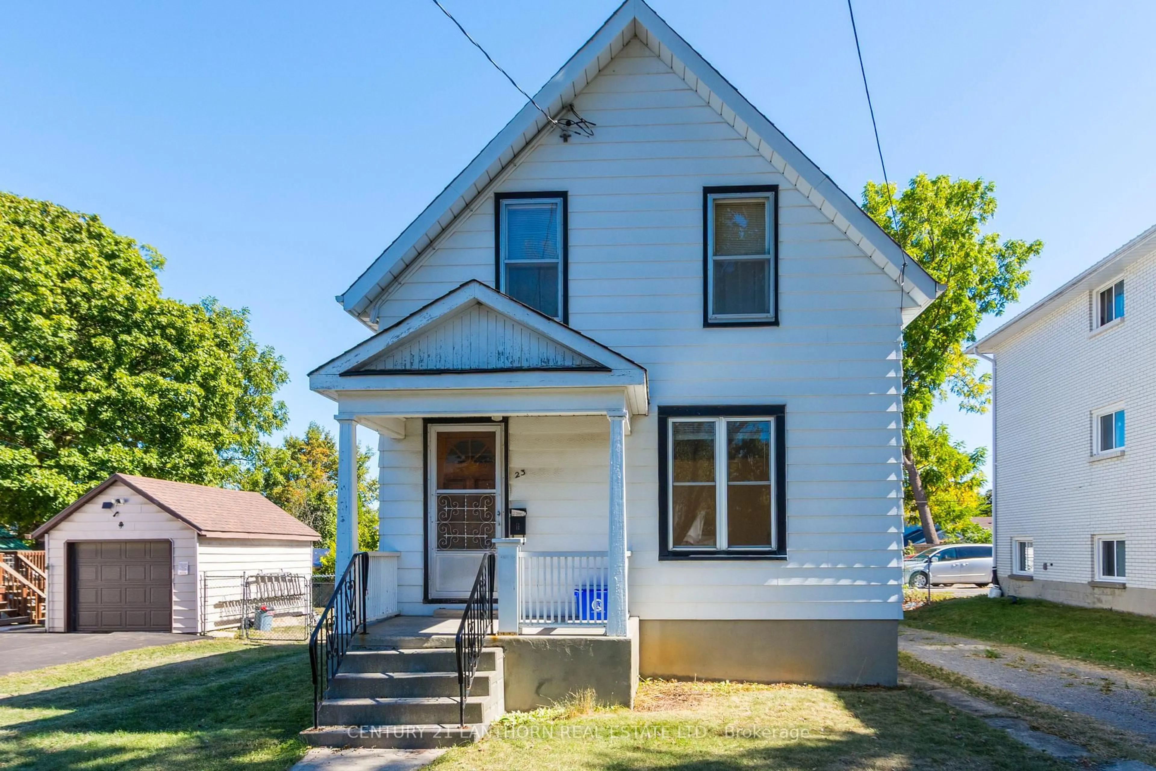 Home with vinyl exterior material, street for 23 Howard St, Belleville Ontario K8P 3T1