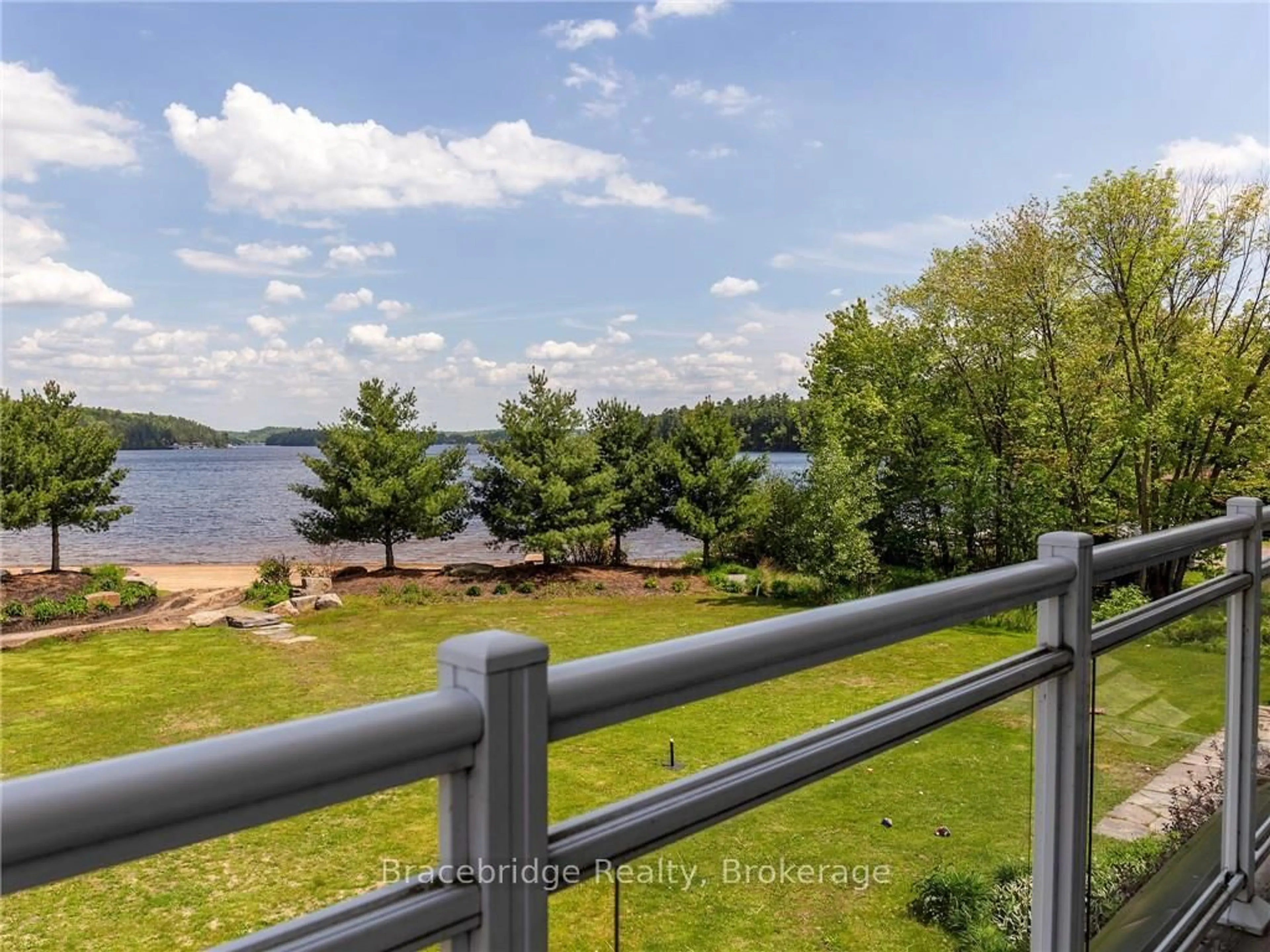 Patio, water/lake/river/ocean view for 1869 Muskoka 118 Highway #G103-D1, Muskoka Lakes Ontario P1L 1W8