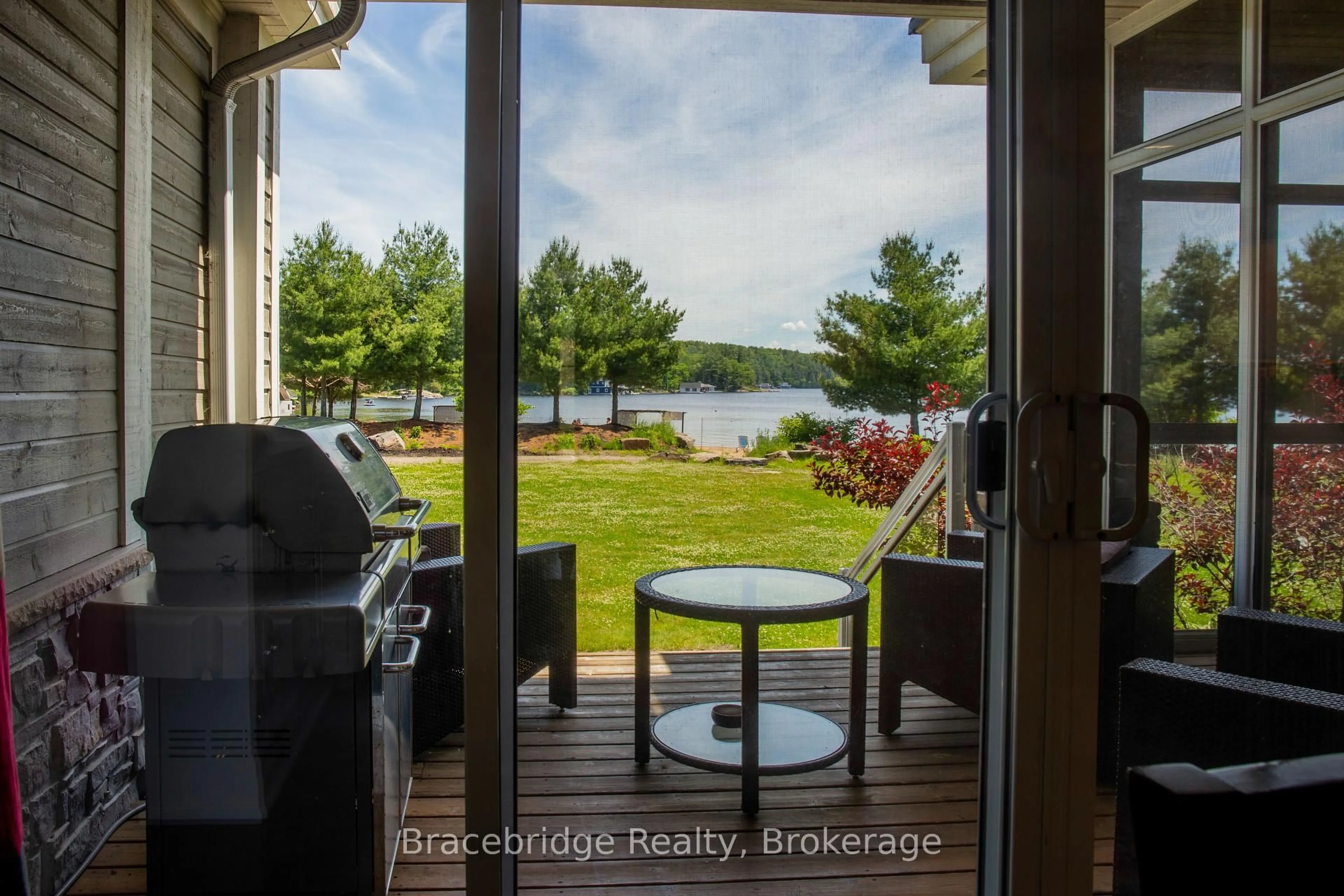 Patio, water/lake/river/ocean view for 1869 Muskoka 118 Highway #G103-D1, Muskoka Lakes Ontario P1L 1W8