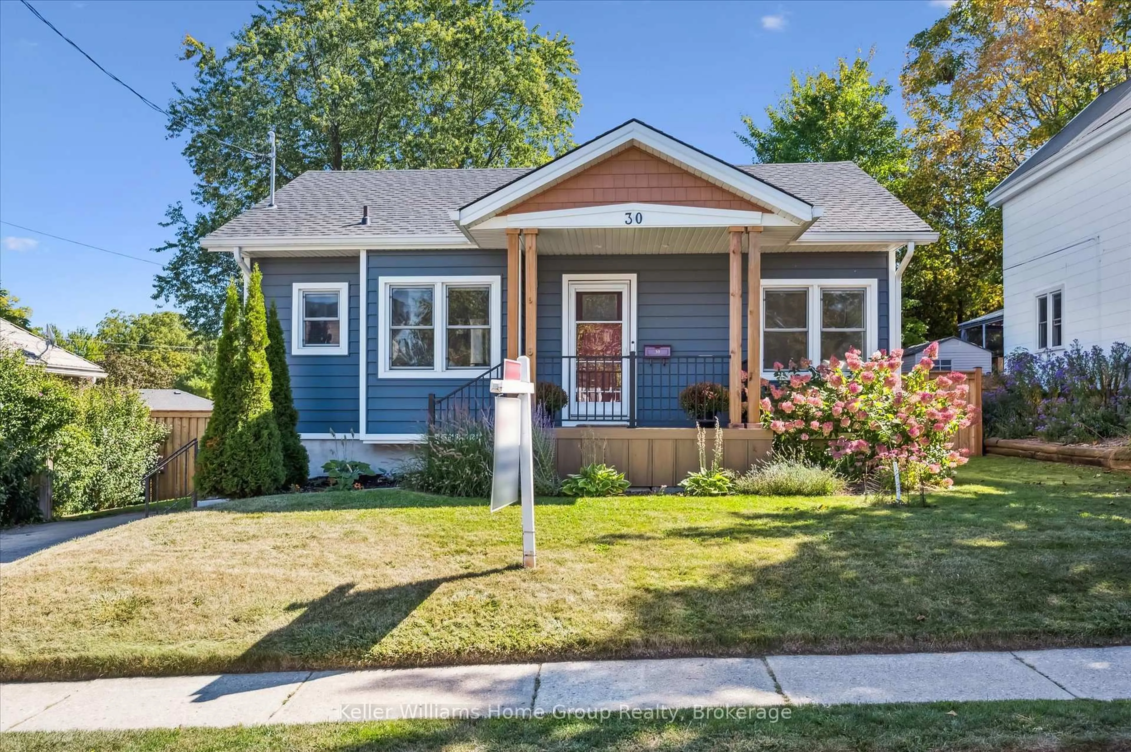 Home with vinyl exterior material, street for 30 Barton St, Guelph Ontario N1H 1M3