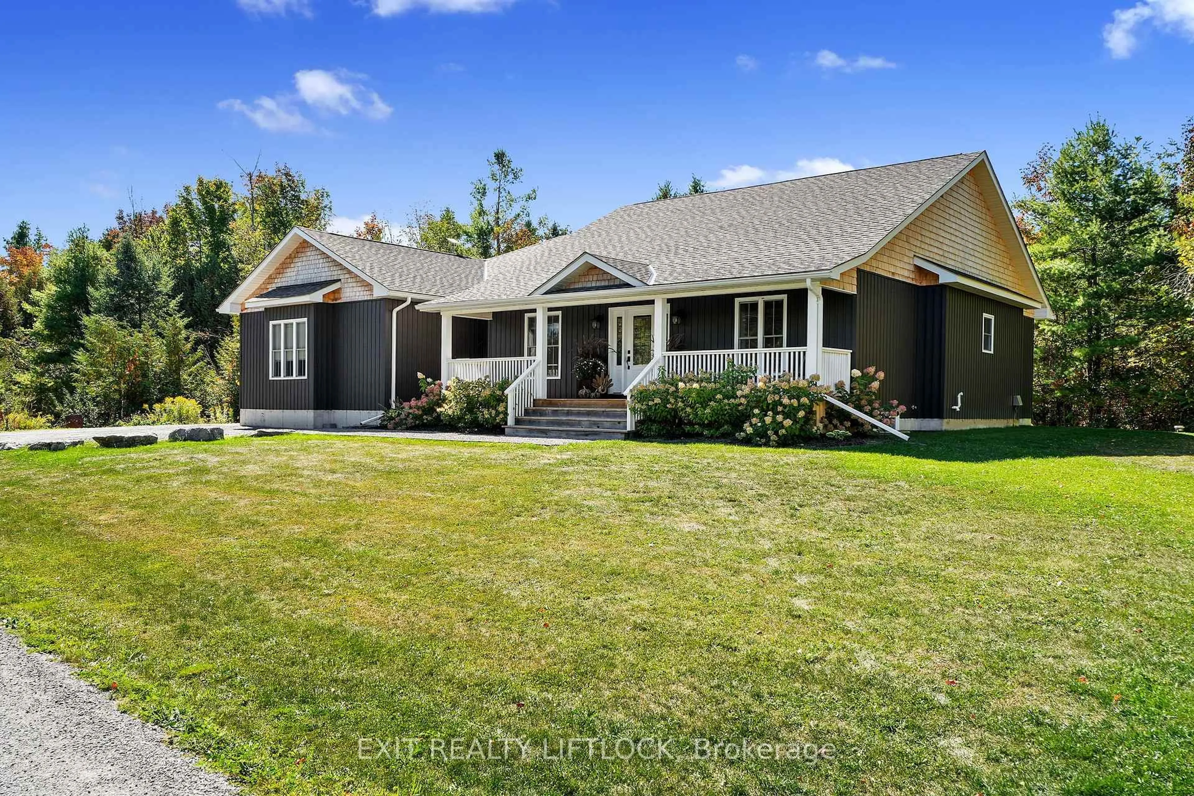 A pic from outside/outdoor area/front of a property/back of a property/a pic from drone, street for 1658 County Road 40, Douro-Dummer Ontario K0L 2V0