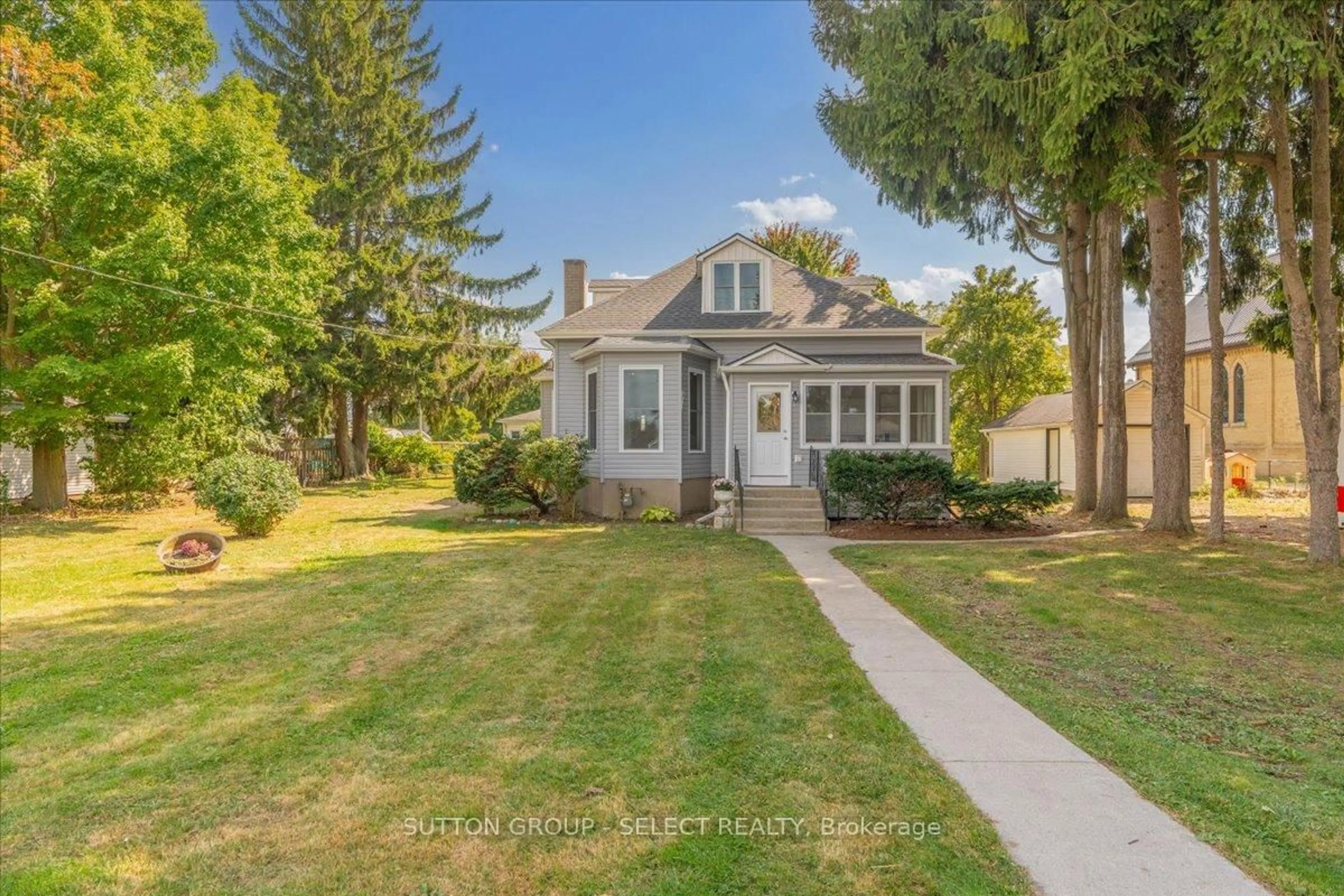 A pic from outside/outdoor area/front of a property/back of a property/a pic from drone, street for 29523 Talbot Line, Dutton/Dunwich Ontario N0L 2M0