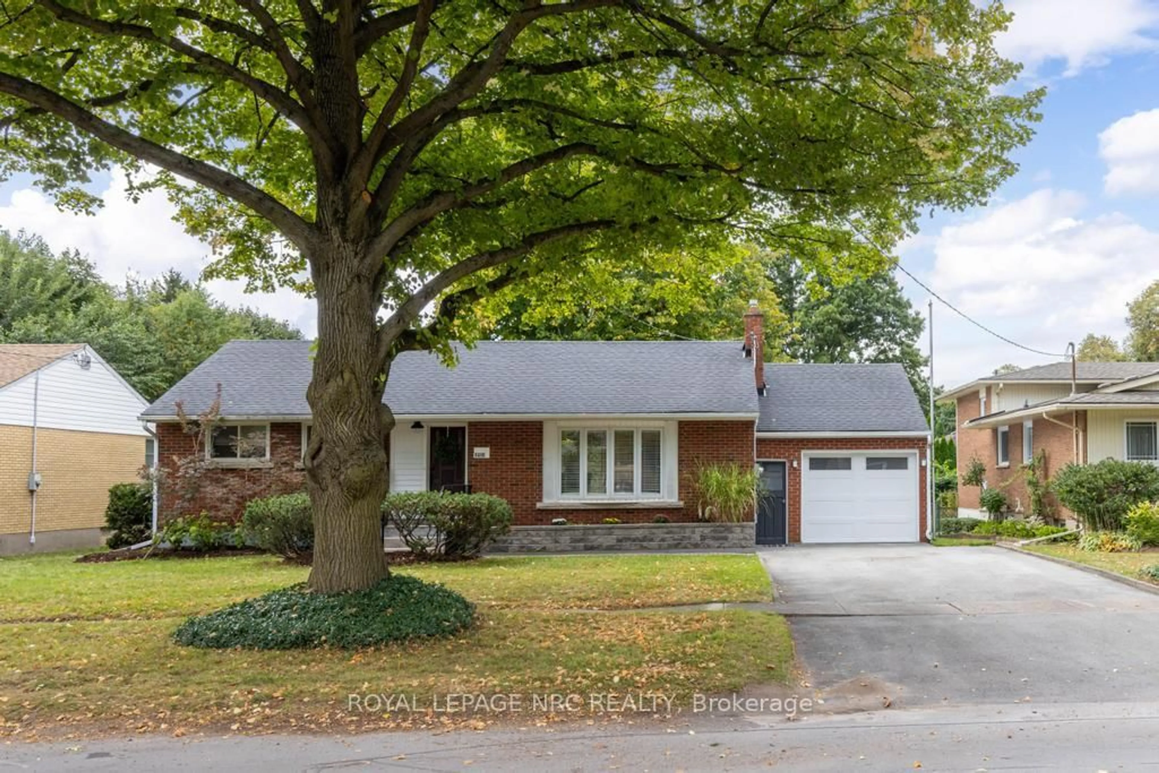 Home with brick exterior material, street for 6486 Mcmicking St, Niagara Falls Ontario L2J 1X1