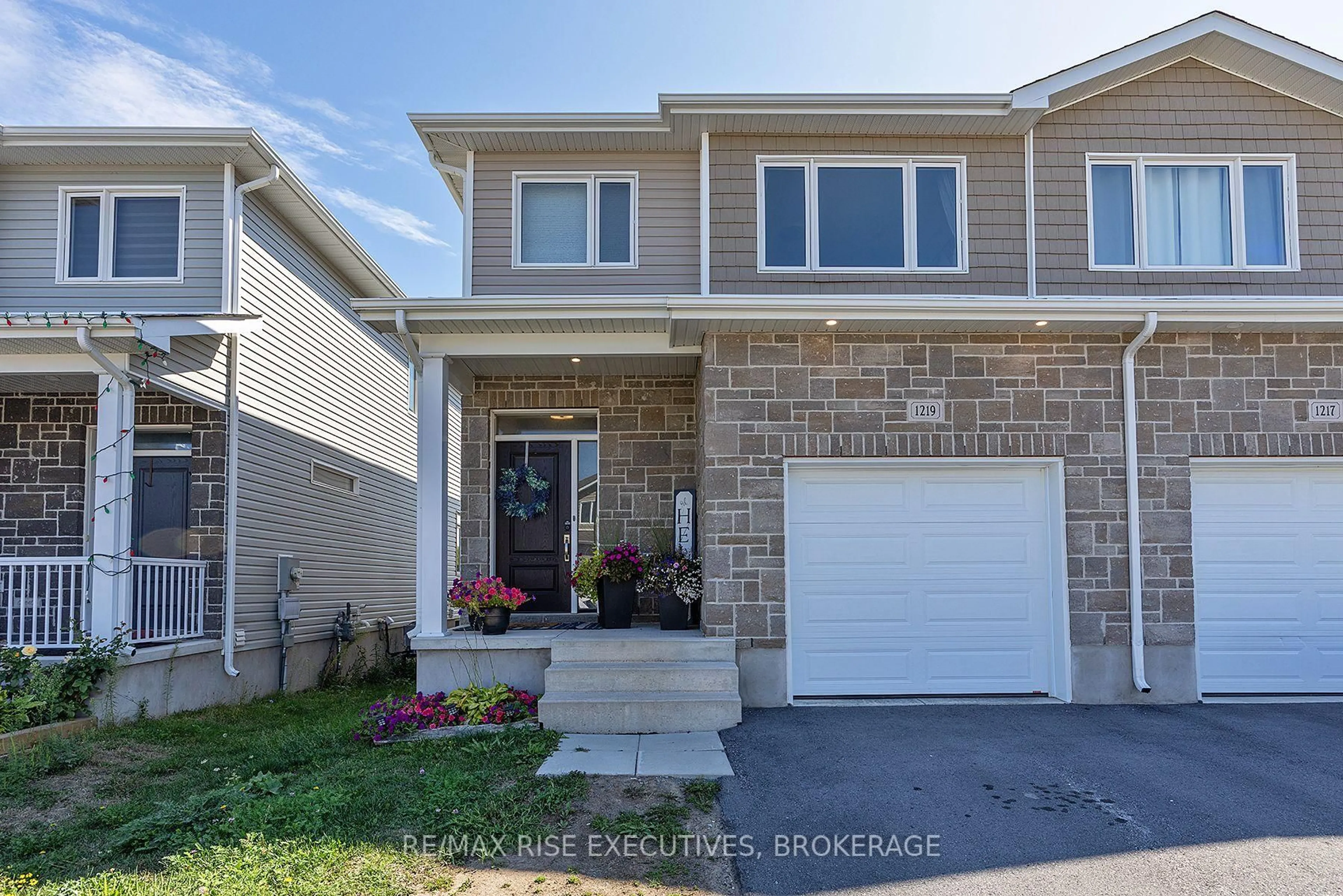 Home with vinyl exterior material, street for 1219 Max Cres, Kingston Ontario K7P 0P2