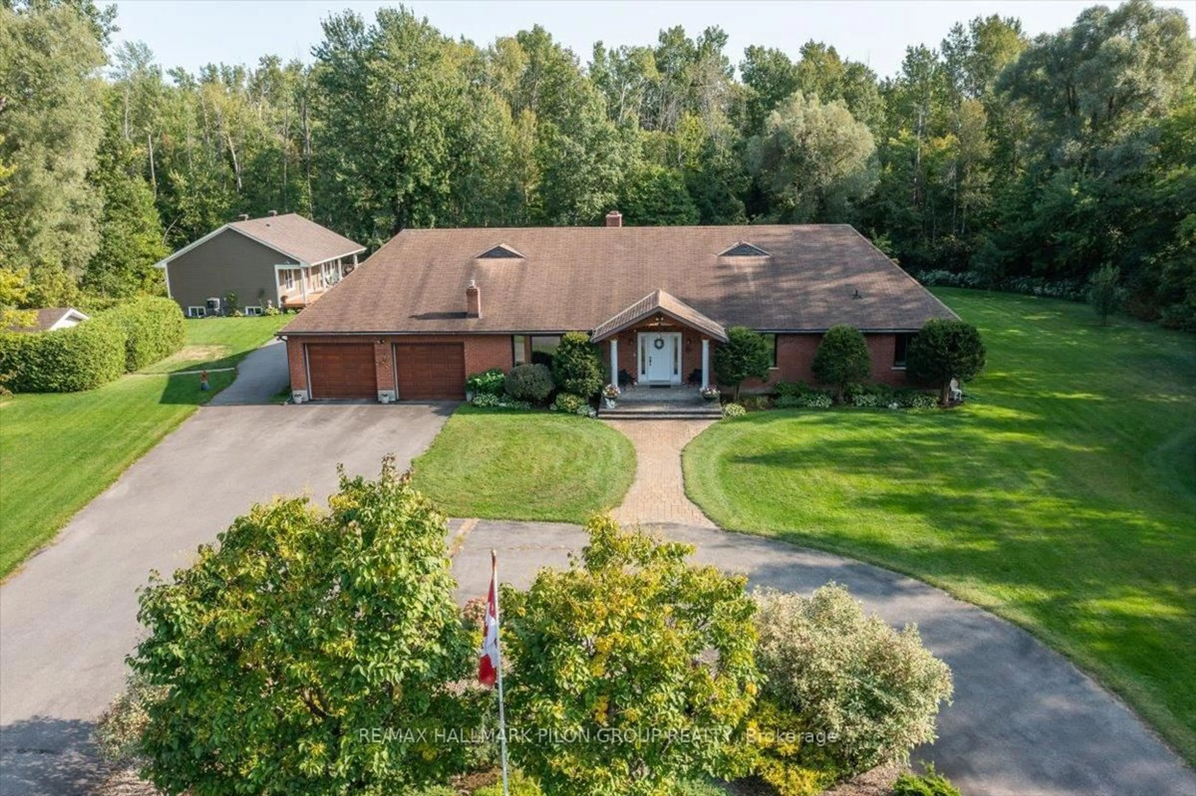 A pic from outside/outdoor area/front of a property/back of a property/a pic from drone, water/lake/river/ocean view for 1717 Lakeshore Dr, Greely Ontario K4P 1H1