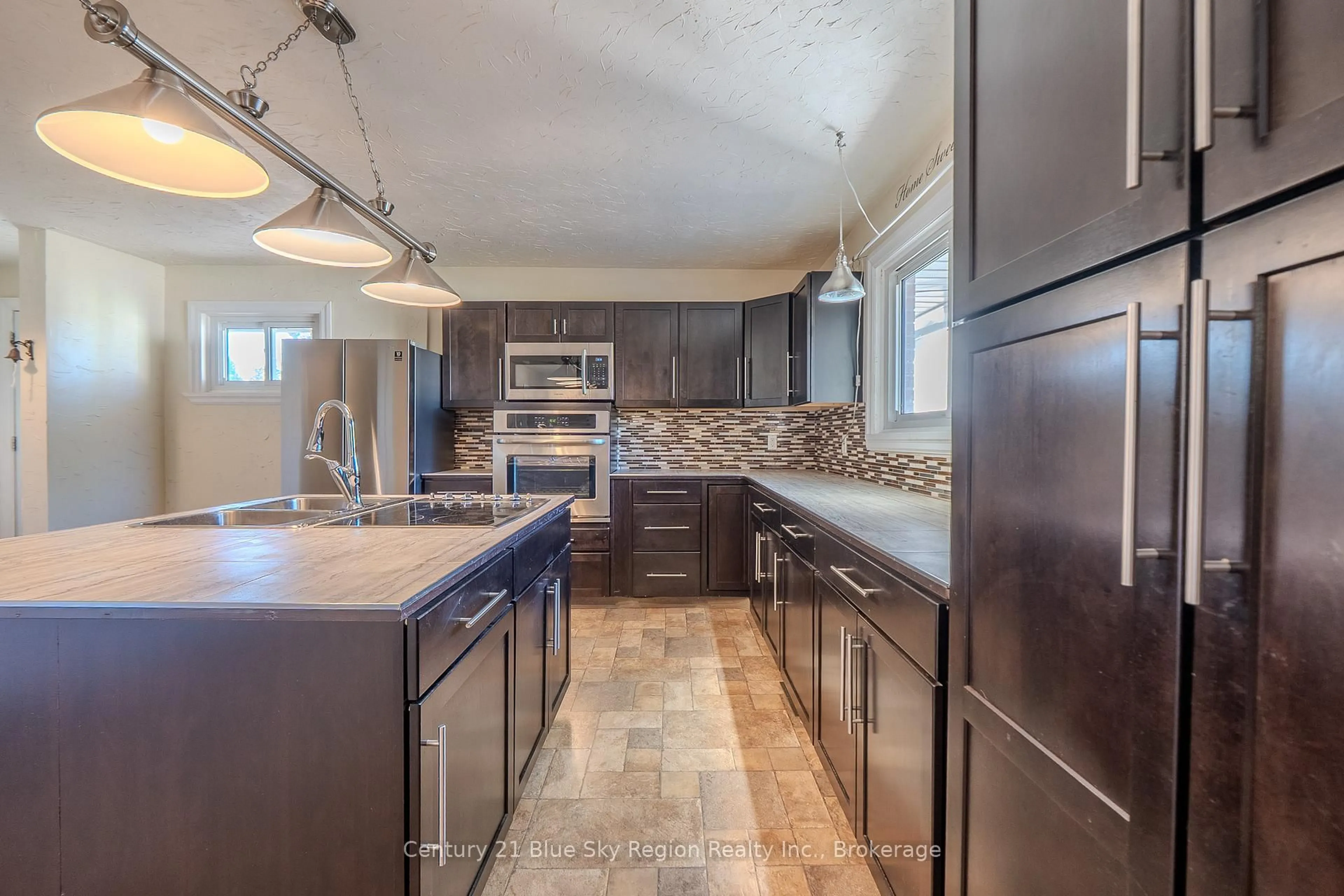 Contemporary kitchen, ceramic/tile floor for 735 Mckay Ave, North Bay Ontario P1B 7W2
