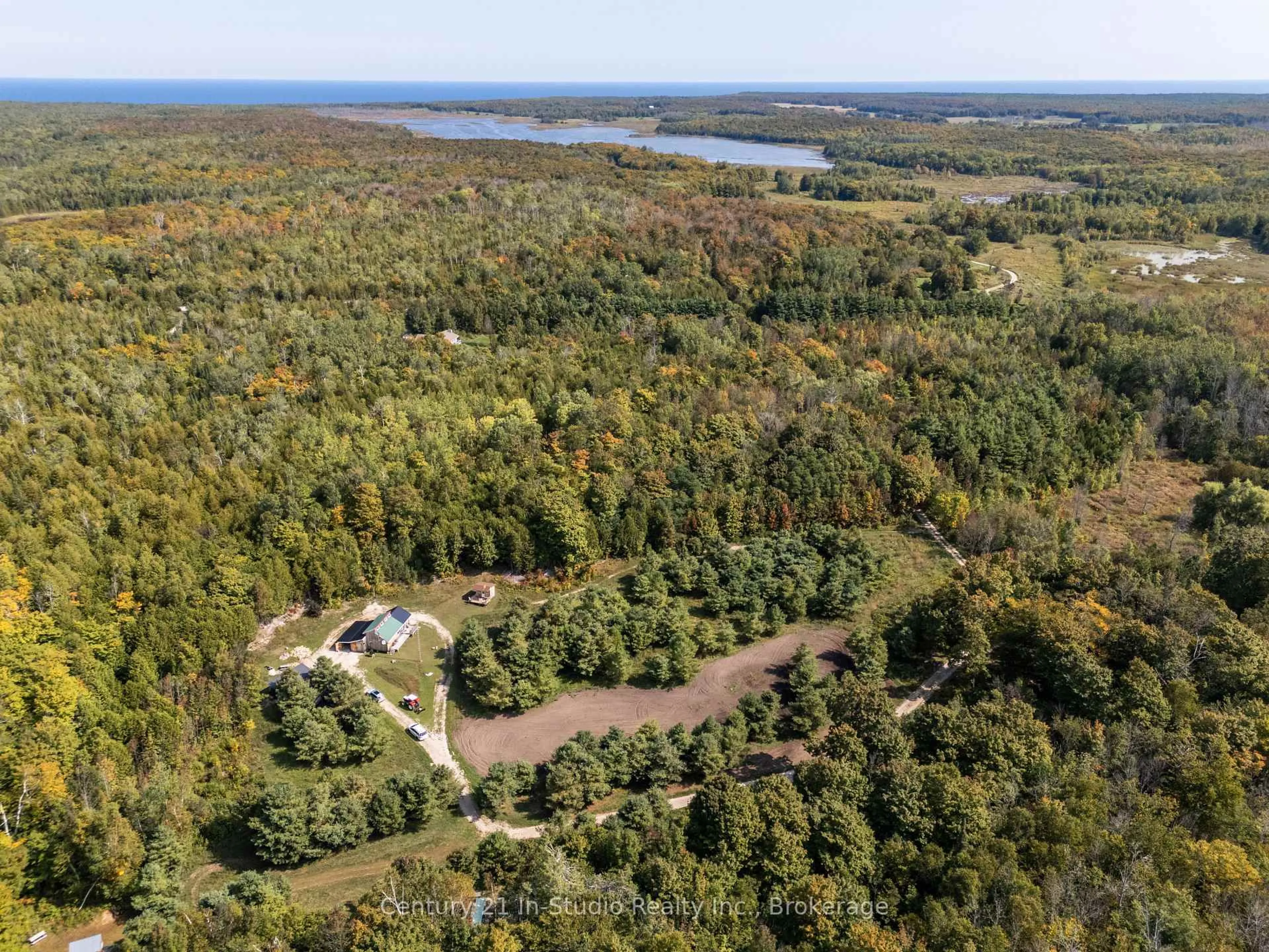 A pic from outside/outdoor area/front of a property/back of a property/a pic from drone, water/lake/river/ocean view for 667 East Rd, Northern Bruce Peninsula Ontario N0H 1W0