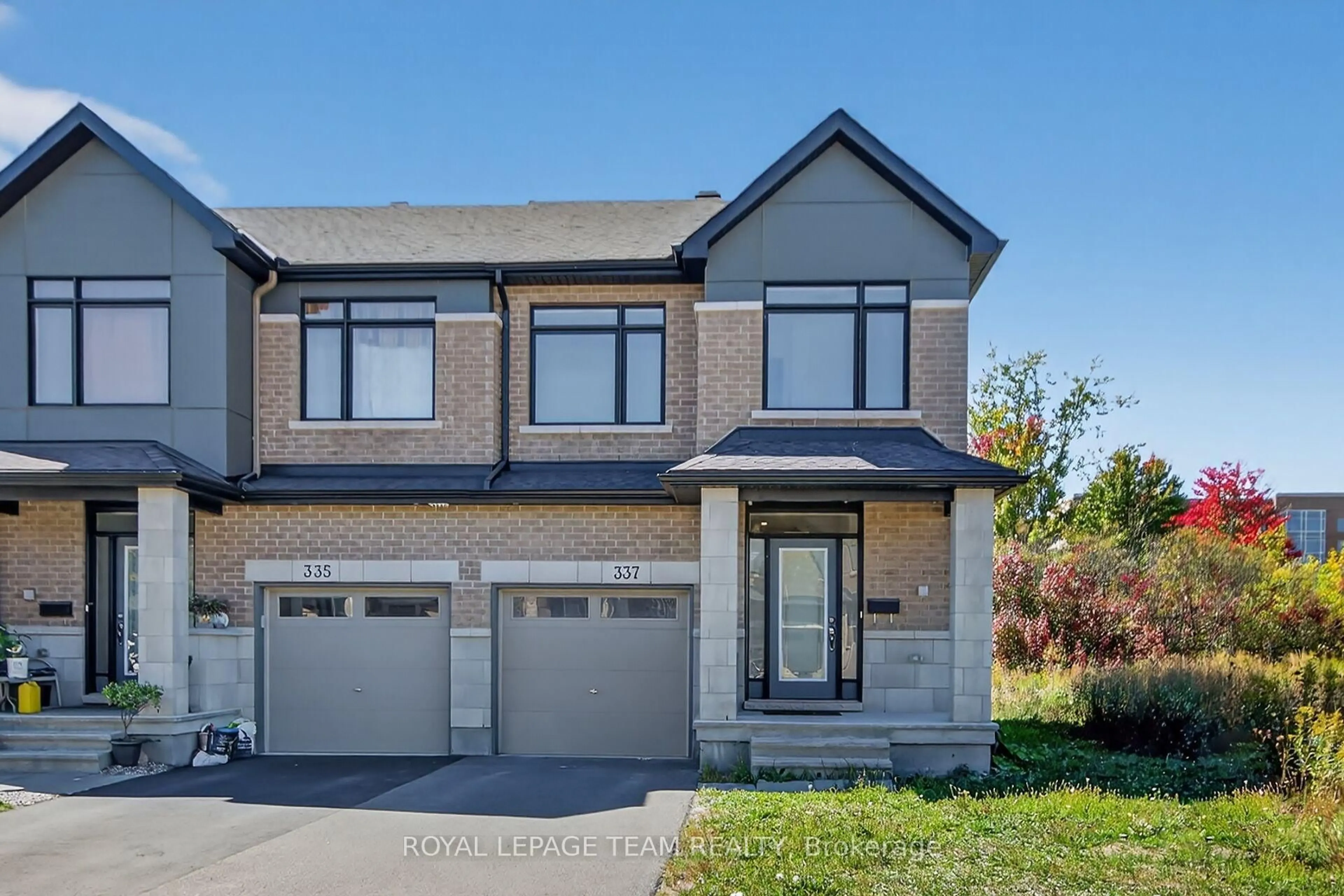 Home with brick exterior material, street for 337 Ibanez Walk, Ottawa Ontario K1T 0V8