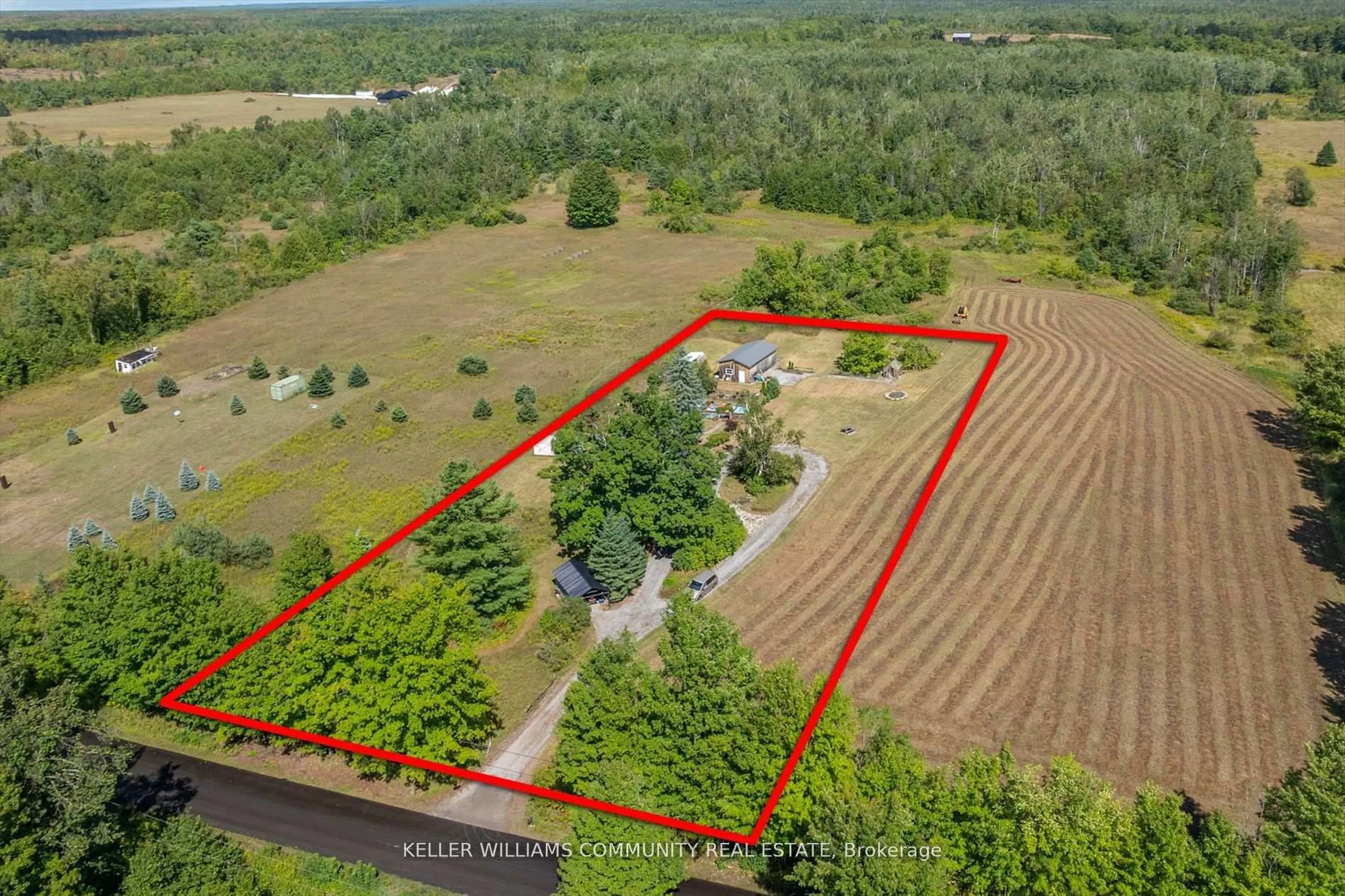 A pic from outside/outdoor area/front of a property/back of a property/a pic from drone, forest/trees view for 372 County Road 41 Rd, Kawartha Lakes Ontario K0M 2B0