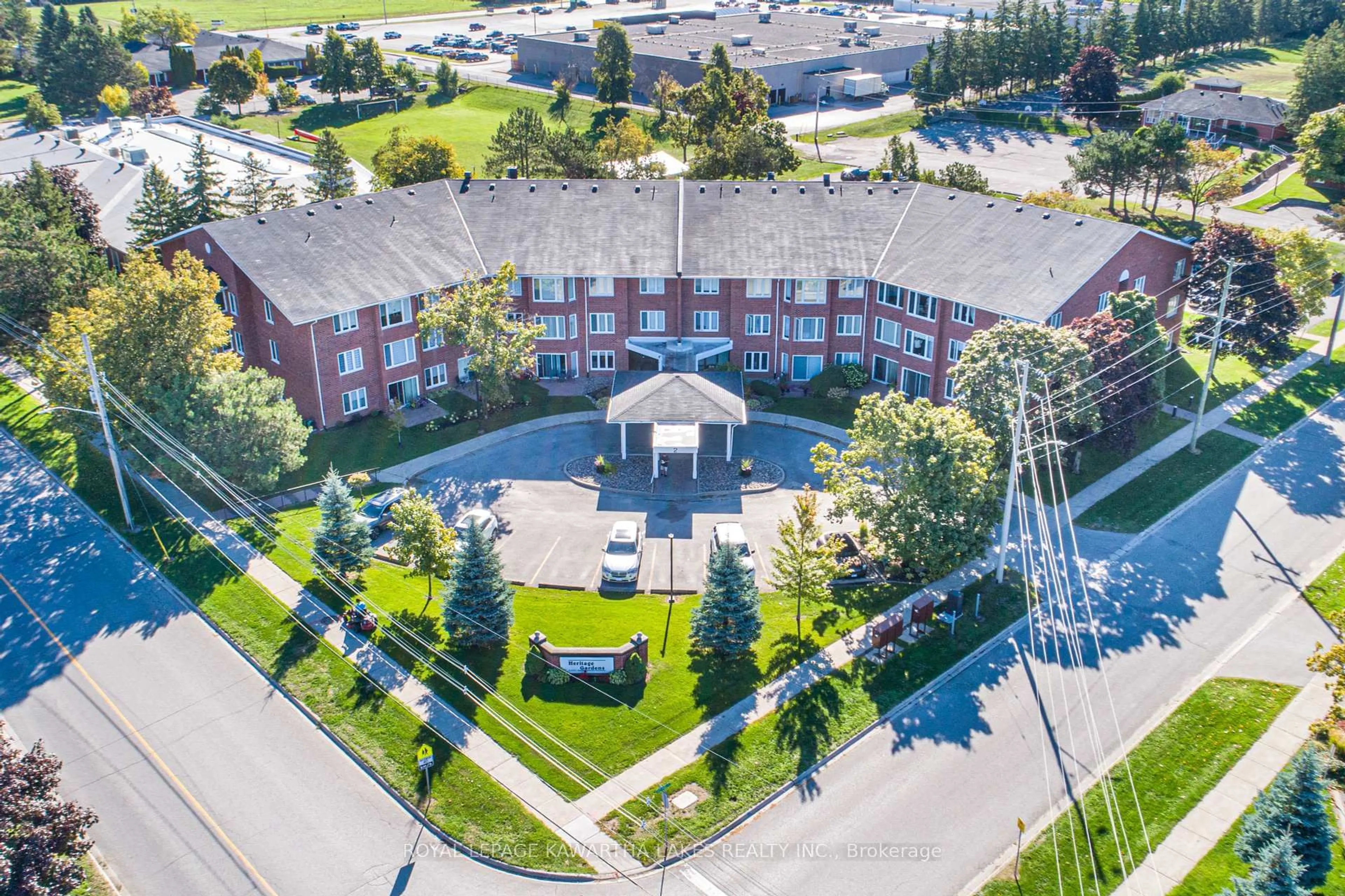 A pic from outside/outdoor area/front of a property/back of a property/a pic from drone, unknown for 2 Heritage Way #215, Kawartha Lakes Ontario K9V 5P5