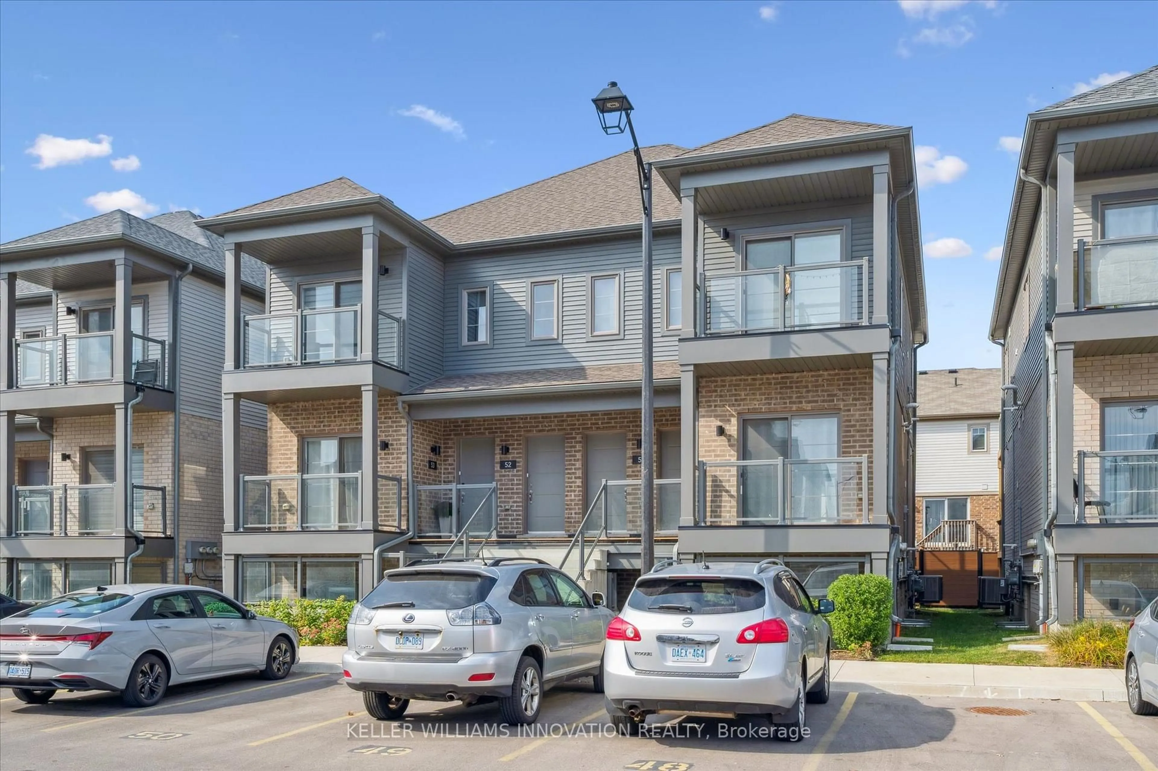 A pic from outside/outdoor area/front of a property/back of a property/a pic from drone, street for 205 West Oak Tr #53, Kitchener Ontario N2R 0R9