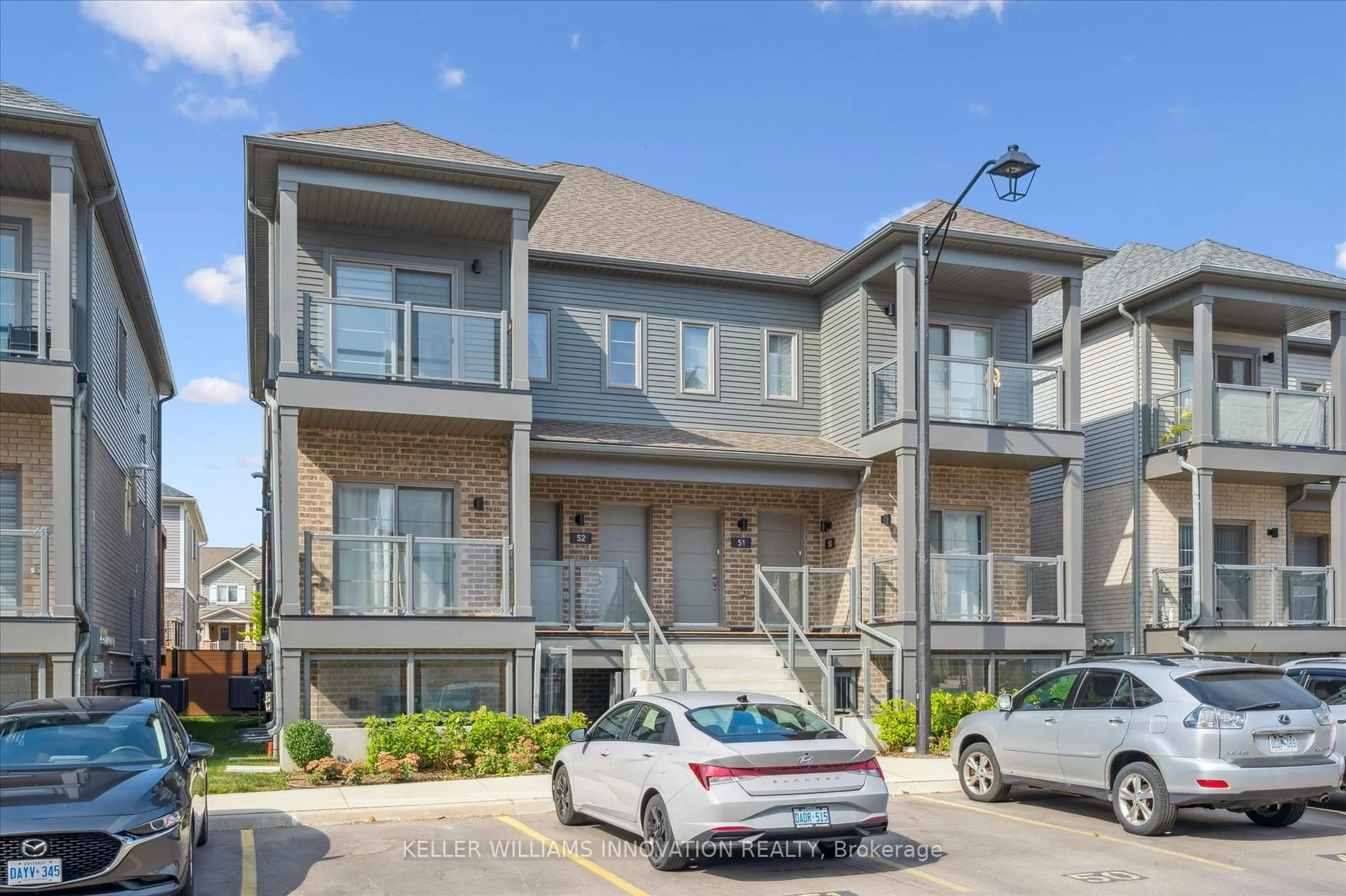 A pic from outside/outdoor area/front of a property/back of a property/a pic from drone, street for 205 West Oak Tr #53, Kitchener Ontario N2R 0R9