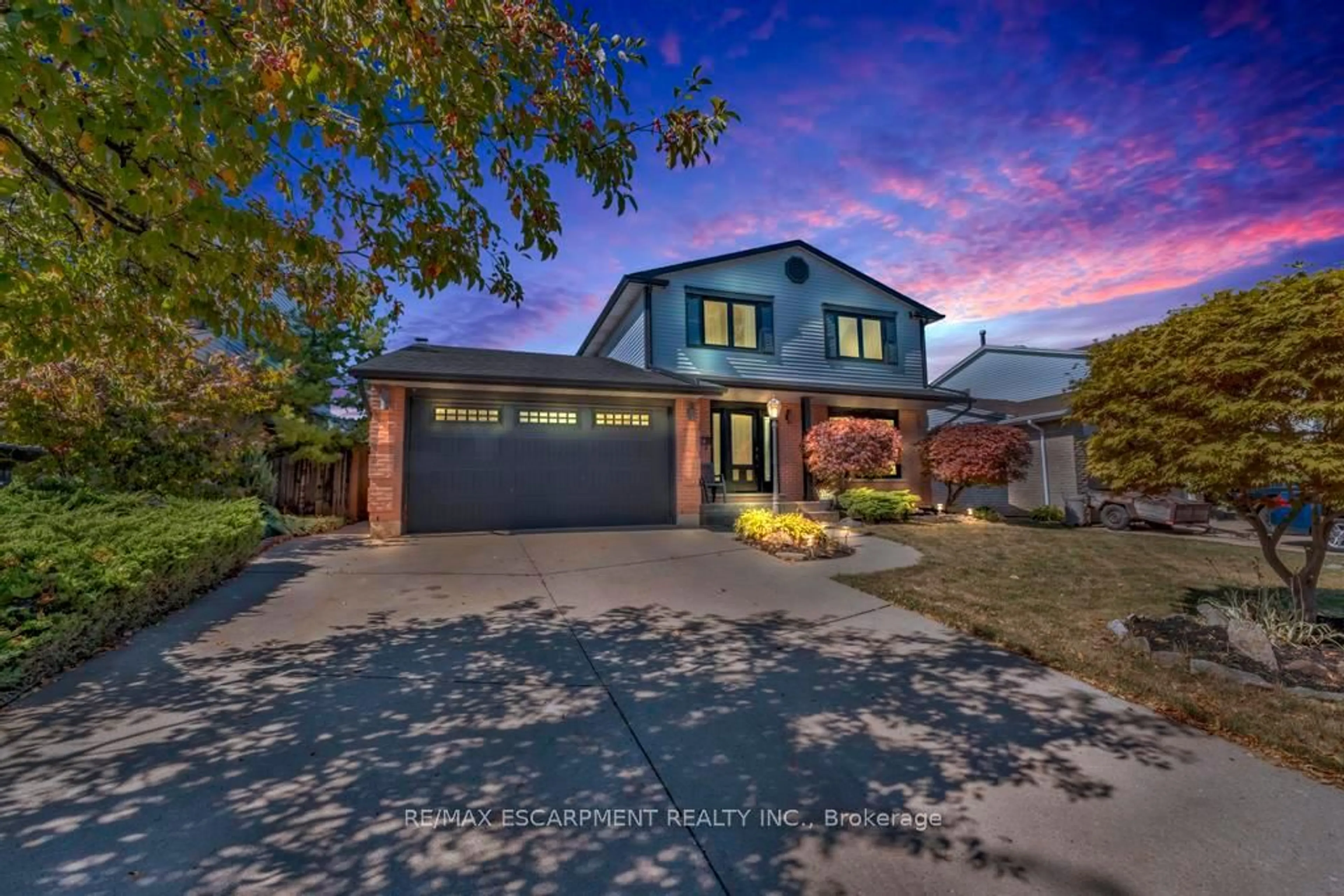 Home with brick exterior material, street for 14 Greening Ave, Hamilton Ontario L8E 3X5