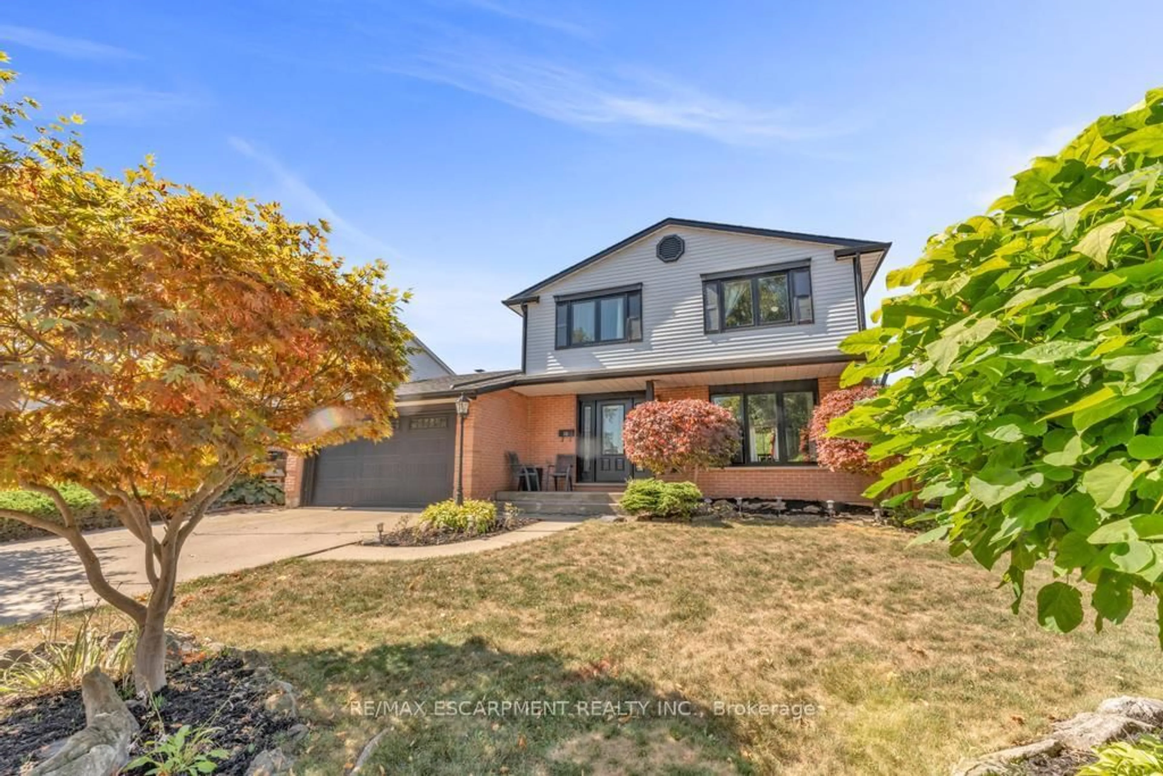 Home with brick exterior material, street for 14 Greening Ave, Hamilton Ontario L8E 3X5