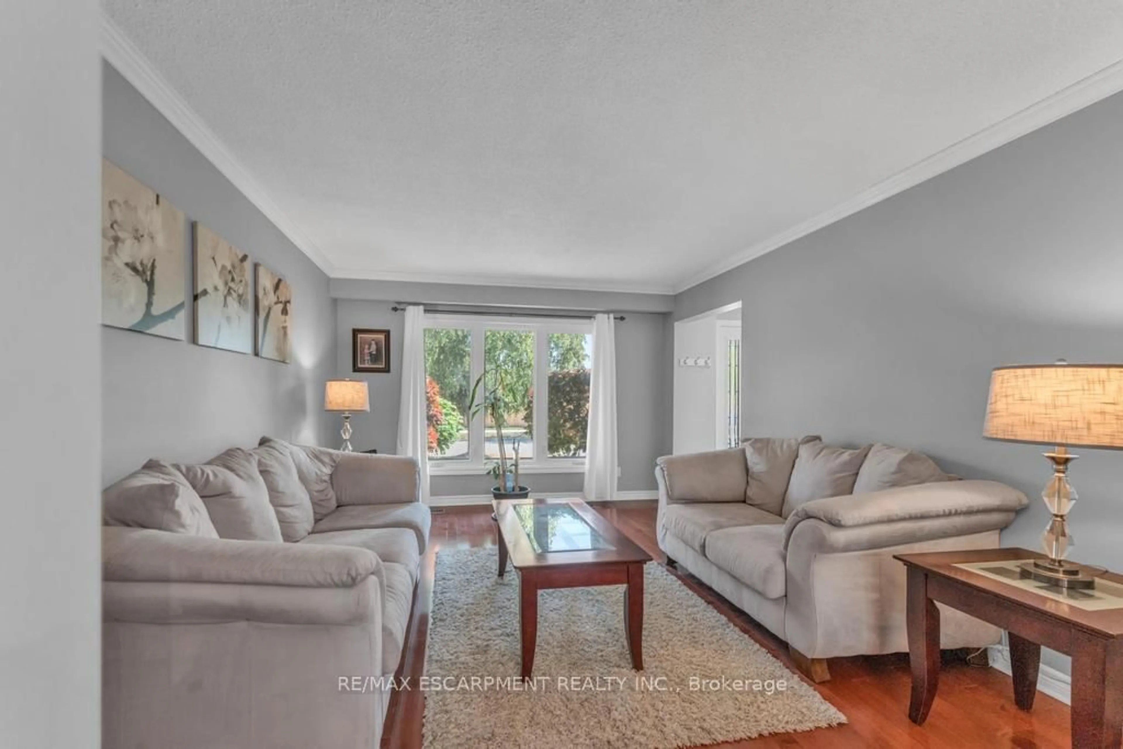 Living room with furniture, unknown for 14 Greening Ave, Hamilton Ontario L8E 3X5