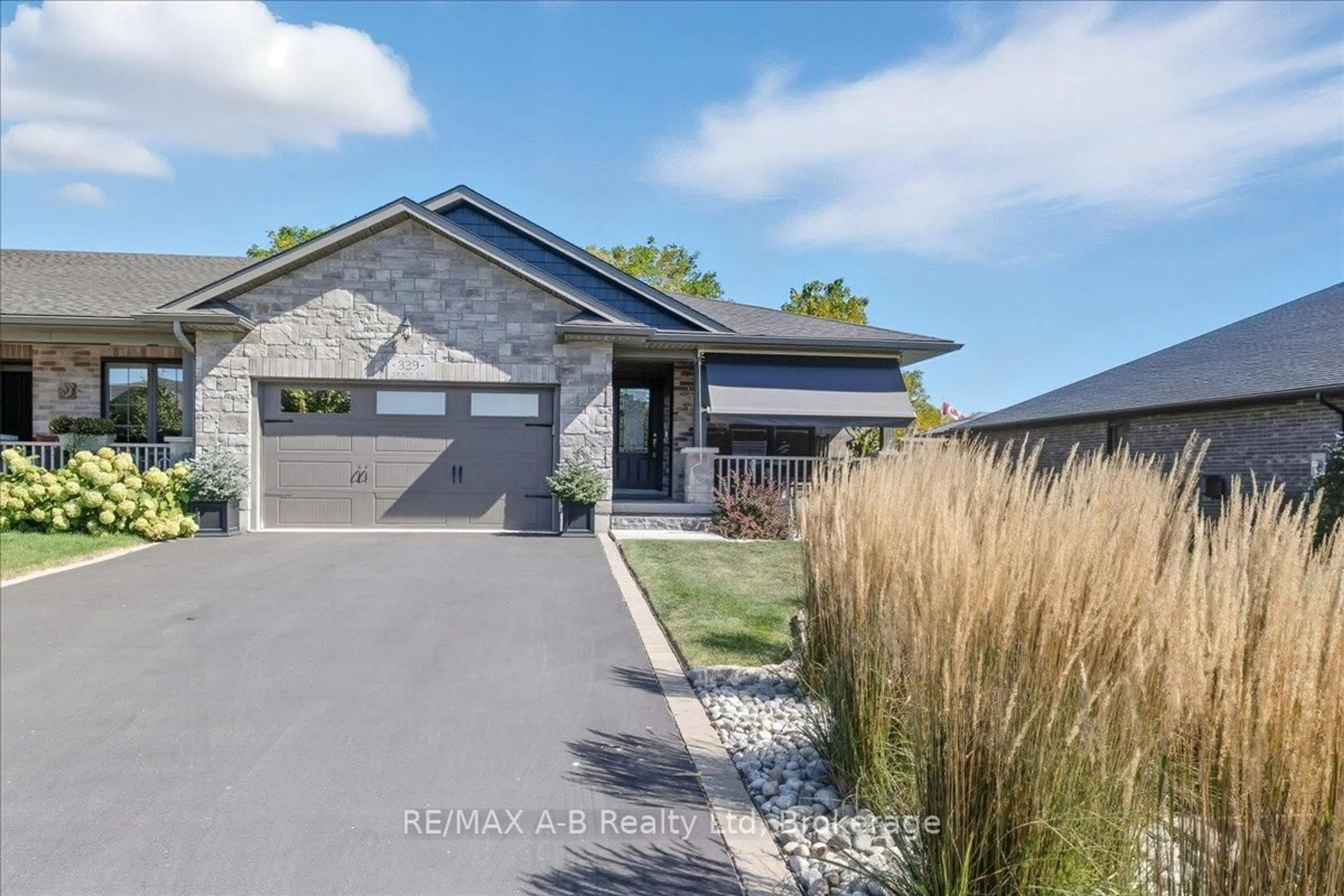 Home with brick exterior material, street for 329 Tracy St, St. Marys Ontario N4X 0B4