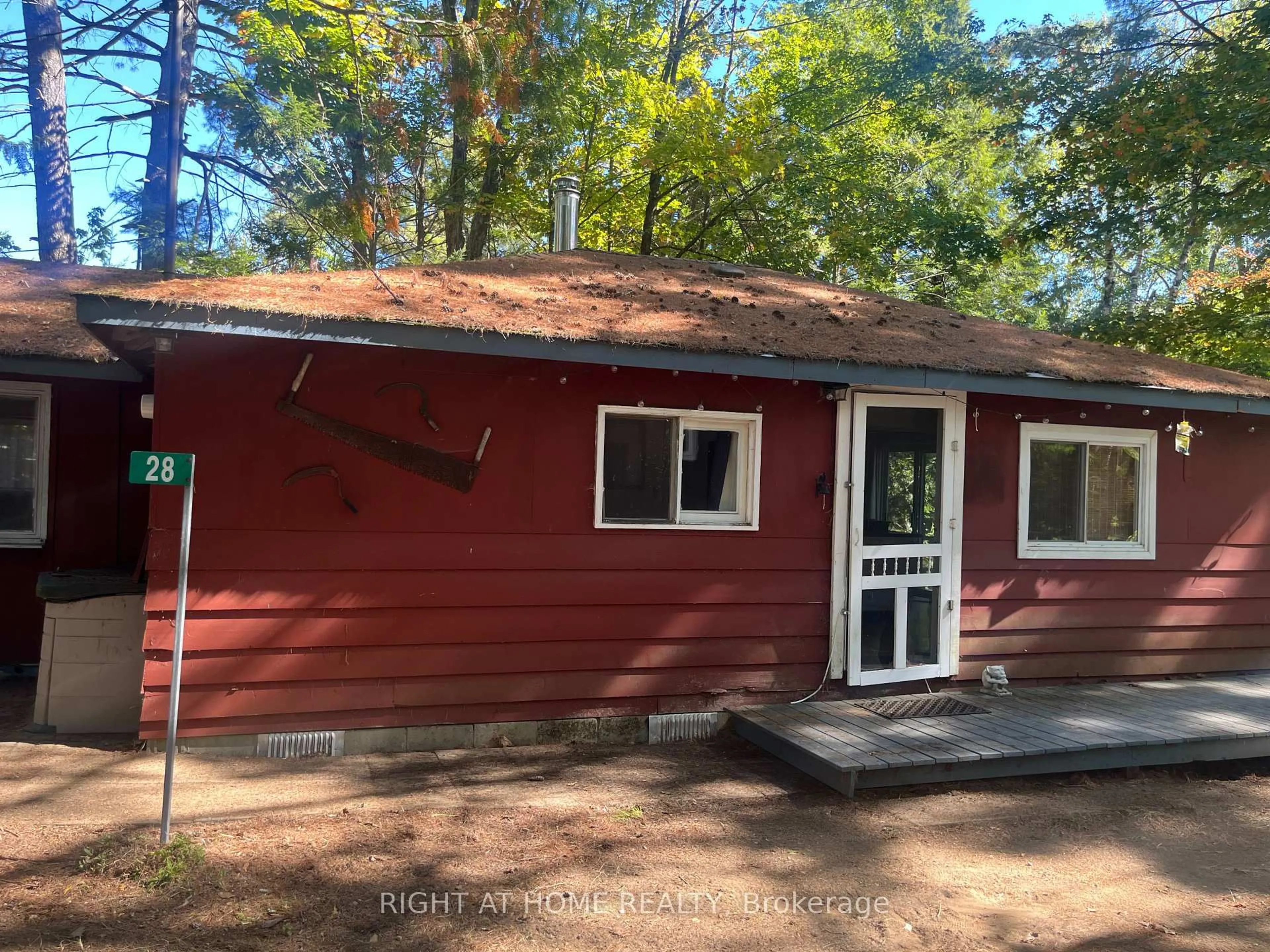 Home with vinyl exterior material, forest/trees view for 28 BAKER Lane, Kawartha Lakes Ontario M4M 1S2