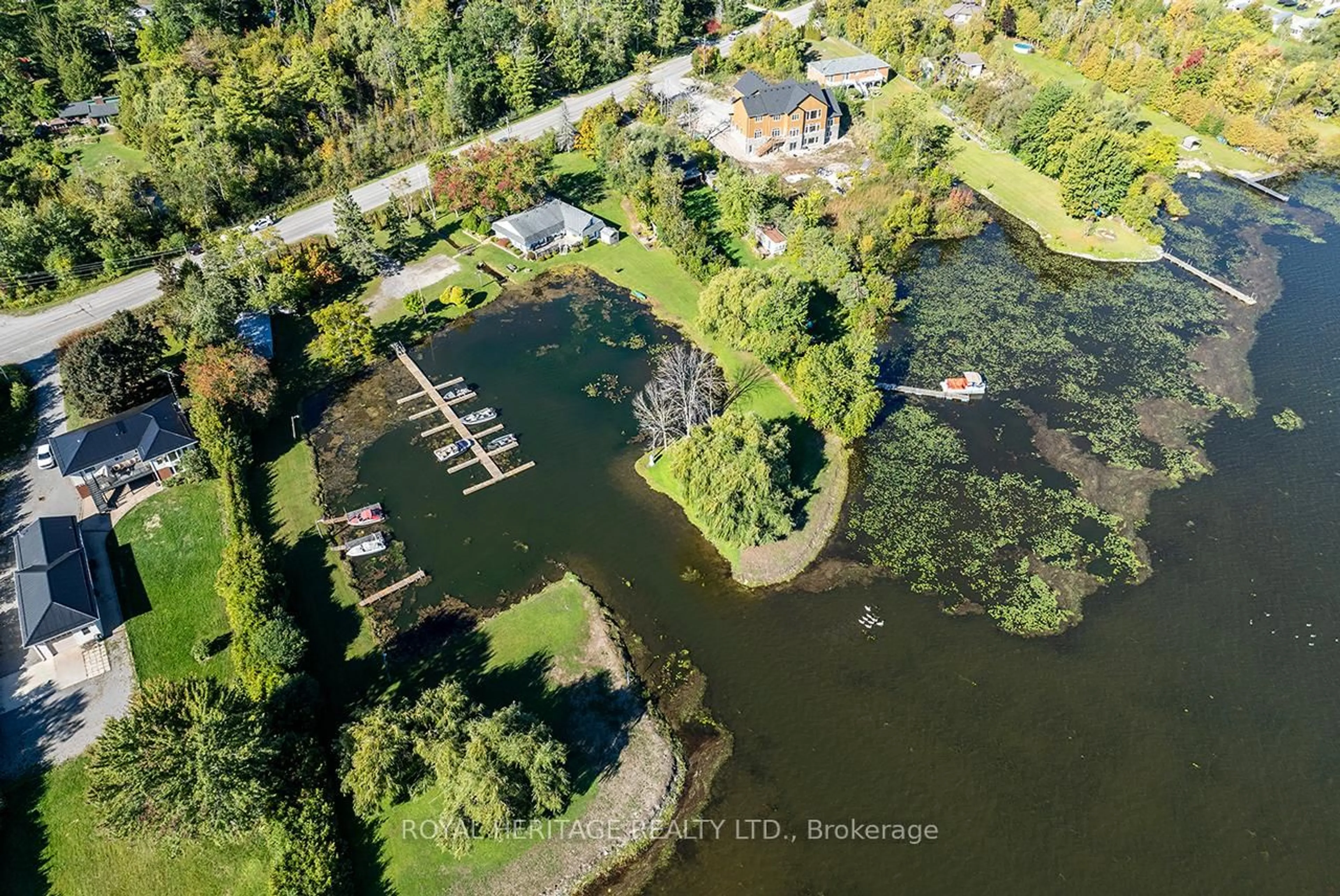 A pic from outside/outdoor area/front of a property/back of a property/a pic from drone, water/lake/river/ocean view for 5183 Rice Lake Dr, Hamilton Township Ontario K0K 1E0