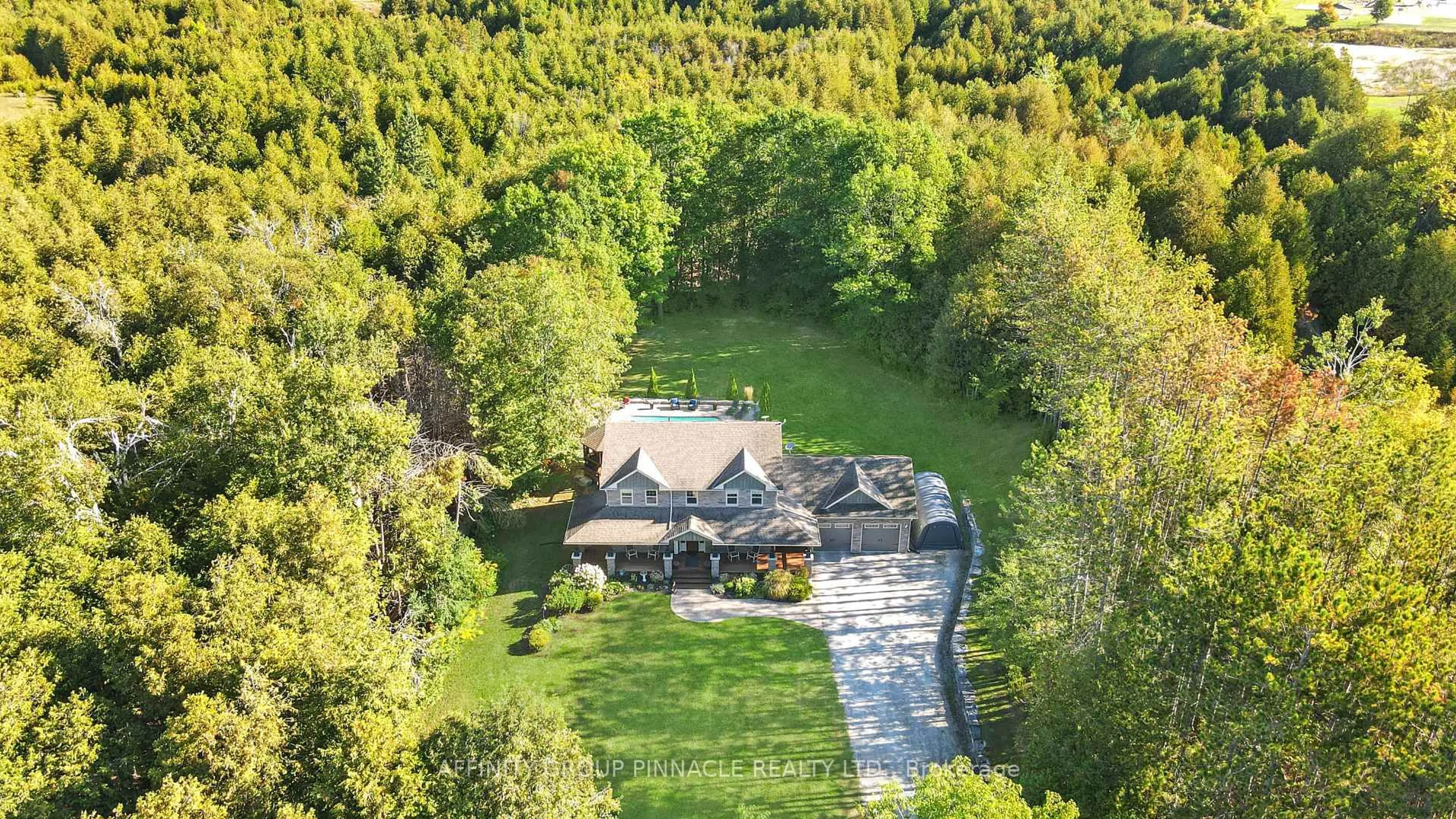 A pic from outside/outdoor area/front of a property/back of a property/a pic from drone, unknown for 297 St Luke's Rd, Kawartha Lakes Ontario K9V 4R5