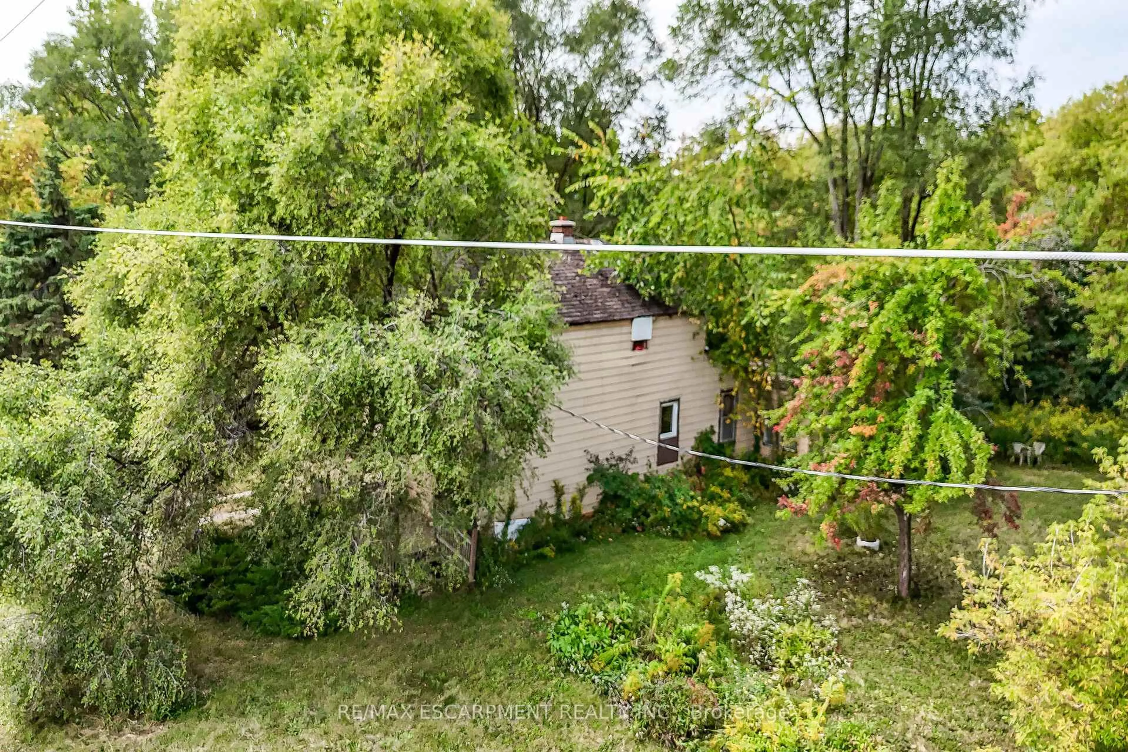 A pic from outside/outdoor area/front of a property/back of a property/a pic from drone, street for 4487 Highway 6 S, Haldimand Ontario N0A 1H0