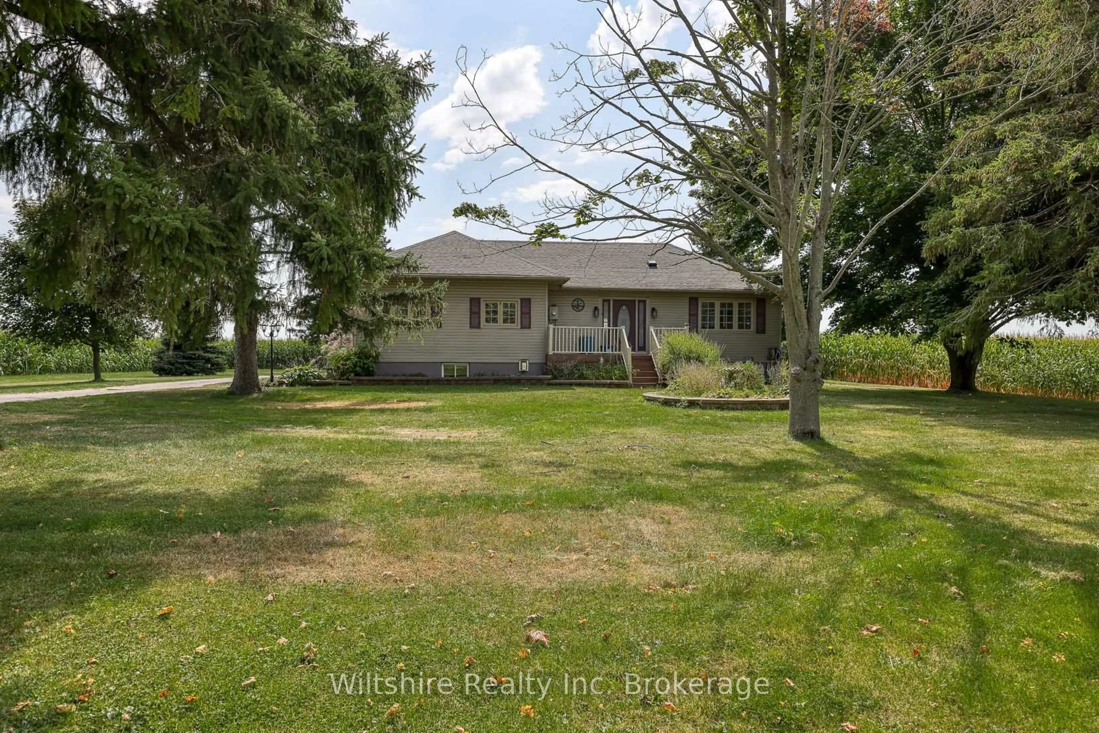 A pic from outside/outdoor area/front of a property/back of a property/a pic from drone, water/lake/river/ocean view for 47209 Talbot Line, Malahide Ontario N5P 3S7