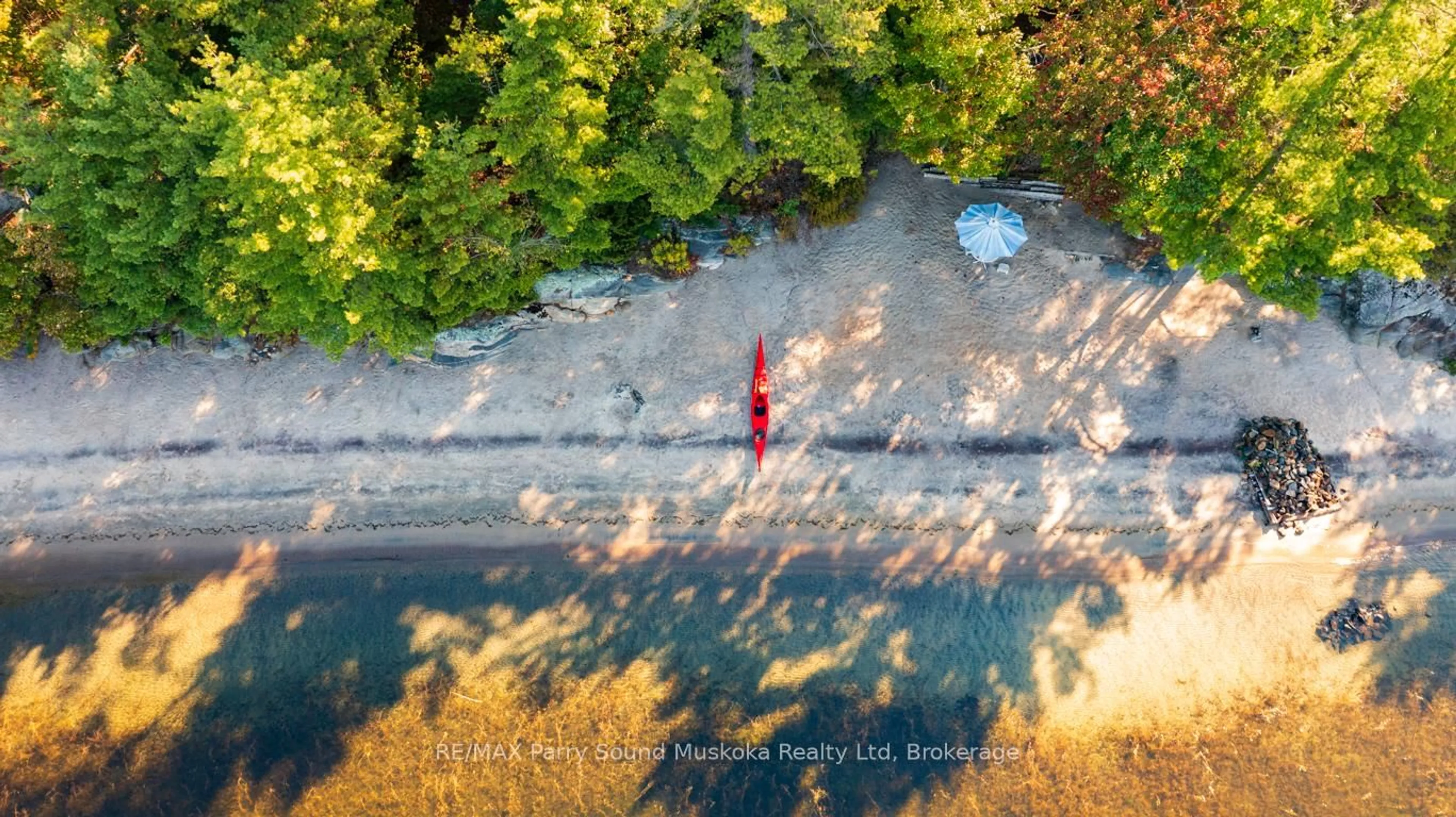 A pic from outside/outdoor area/front of a property/back of a property/a pic from drone, water/lake/river/ocean view for 21 Glenn Burney Rd, Seguin Ontario P2A 2X3