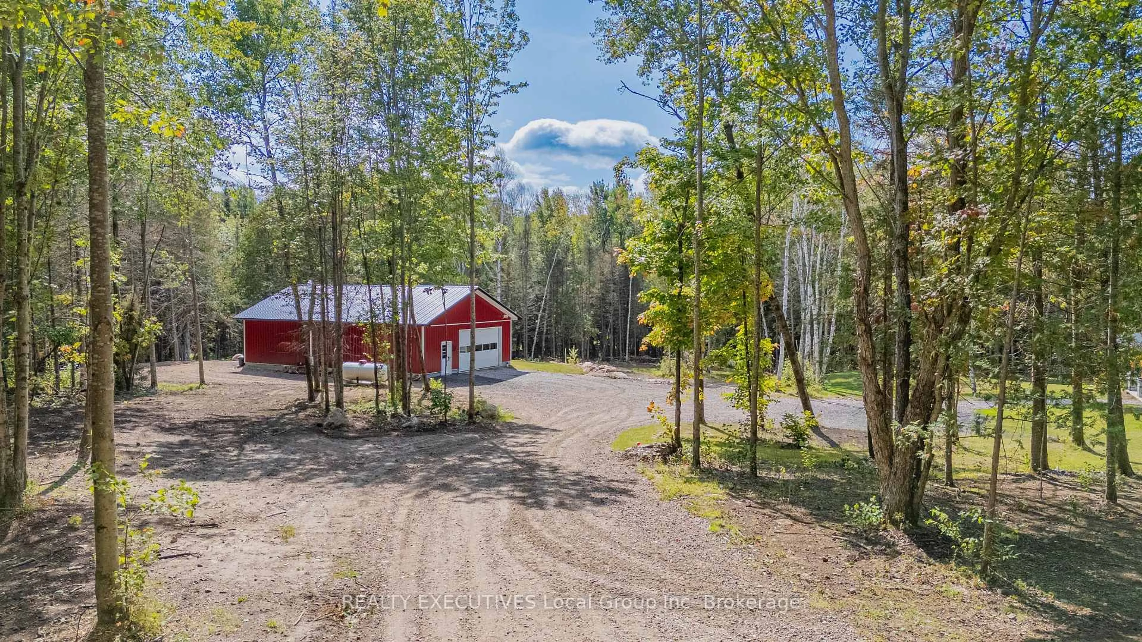A pic from outside/outdoor area/front of a property/back of a property/a pic from drone, forest/trees view for 2149 SOUTH SHORE Rd, Bonfield Ontario P0H 1E0