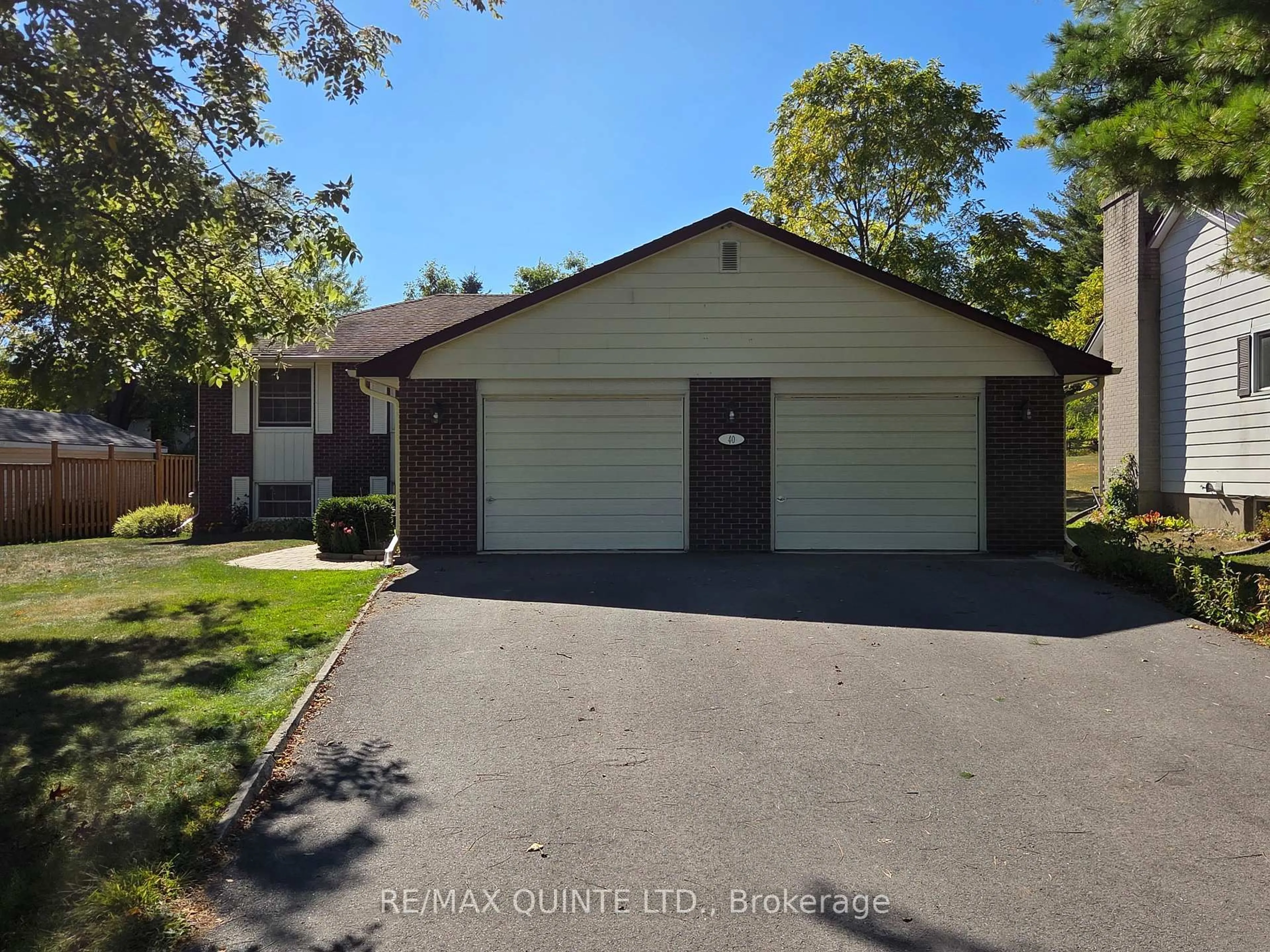 Home with vinyl exterior material, street for 40 College St, Tweed Ontario K0K 3J0