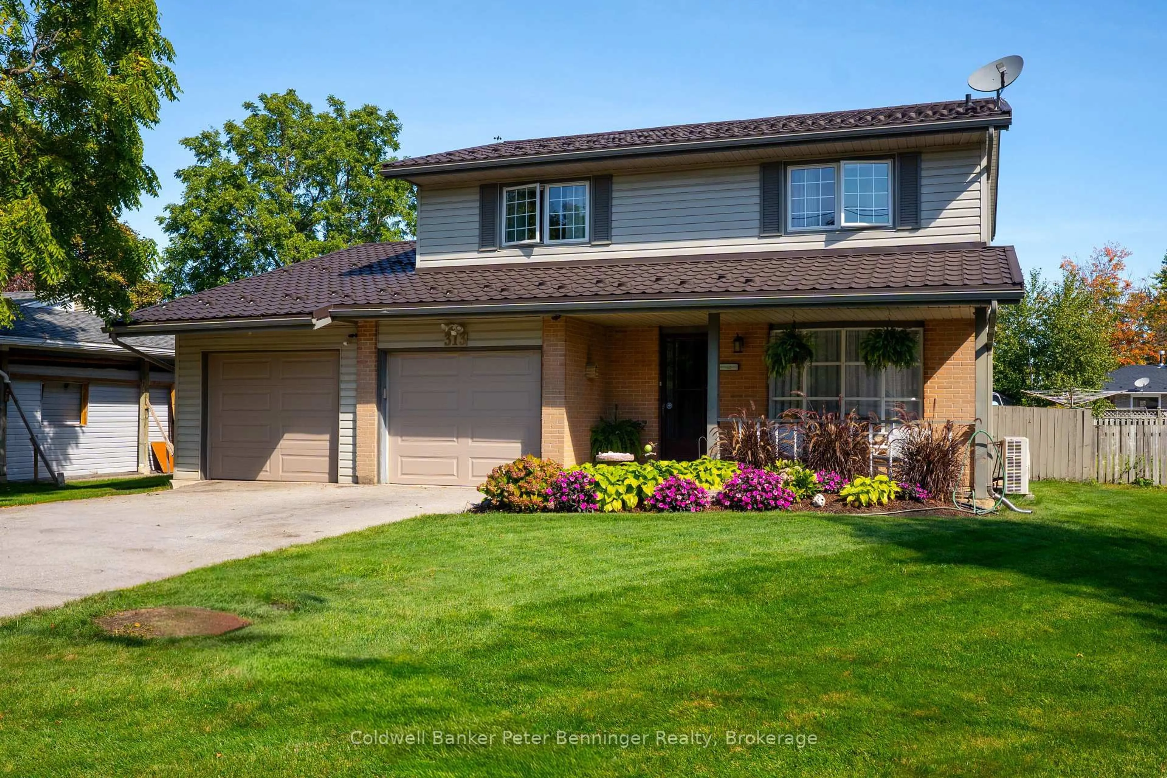 Home with brick exterior material, street for 313 Market St, Saugeen Shores Ontario N0H 2C0