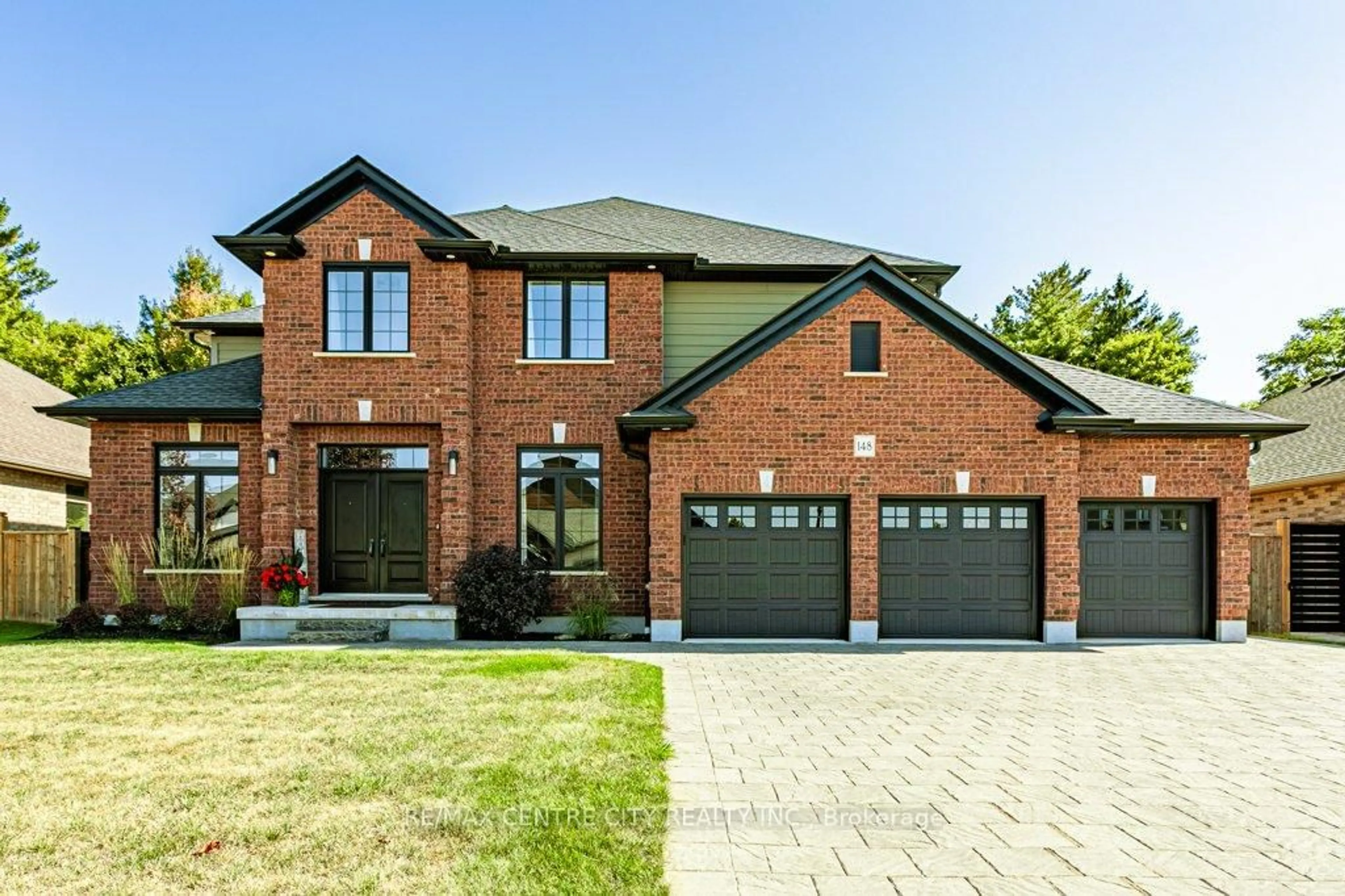 Home with brick exterior material, street for 148 Elliott Tr, Thames Centre Ontario N0M 2P0
