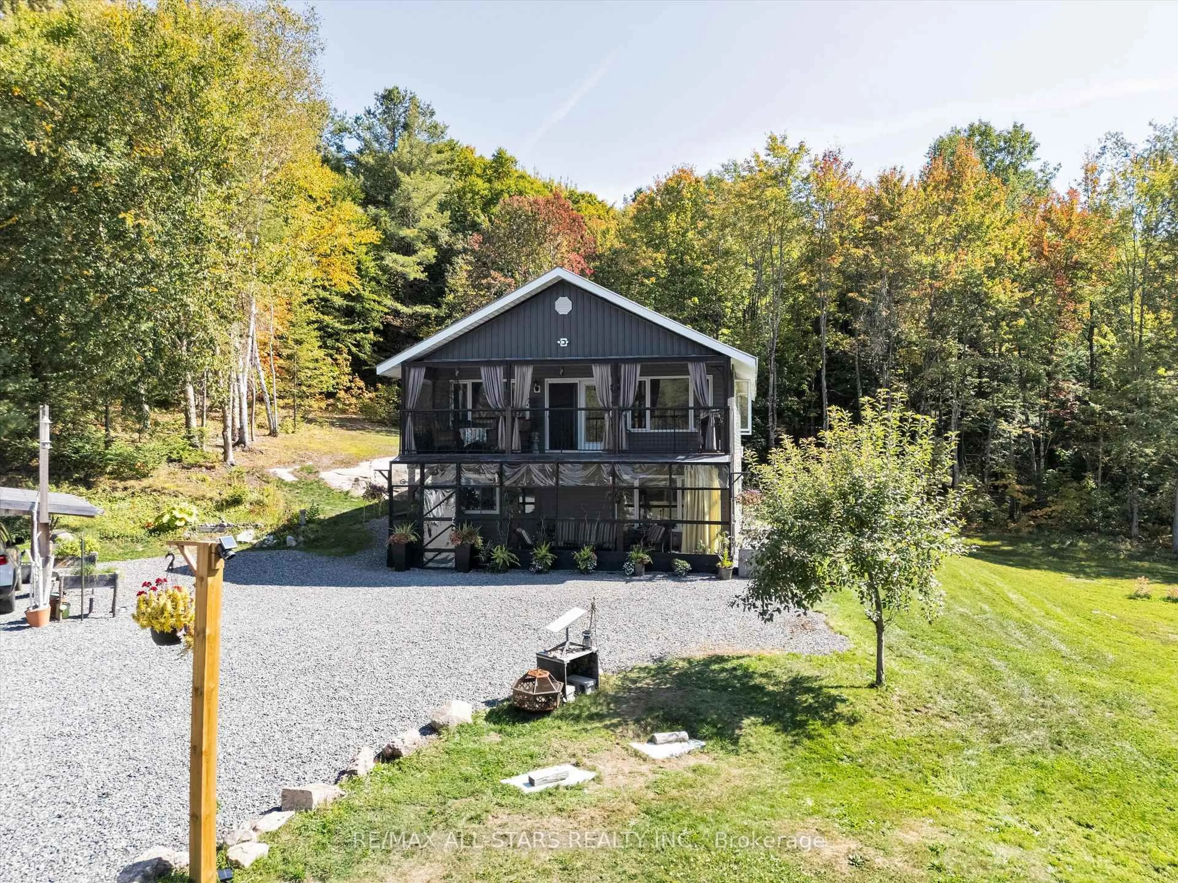 A pic from outside/outdoor area/front of a property/back of a property/a pic from drone, water/lake/river/ocean view for 1435 Falkenburg Rd, Muskoka Lakes Ontario P1L 1X4
