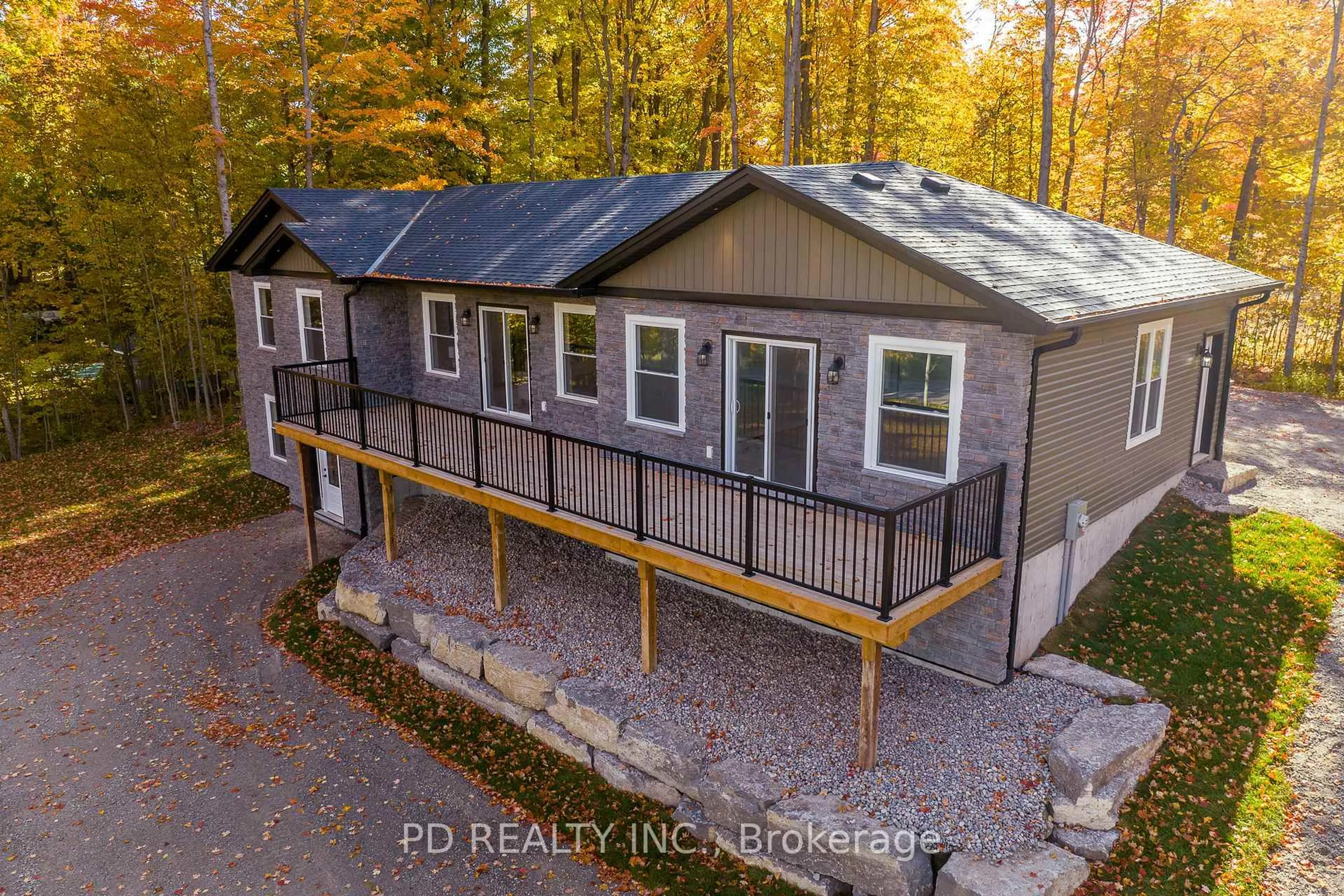 A pic from outside/outdoor area/front of a property/back of a property/a pic from drone, unknown for 2 East St, Kawartha Lakes Ontario L0A 1A0