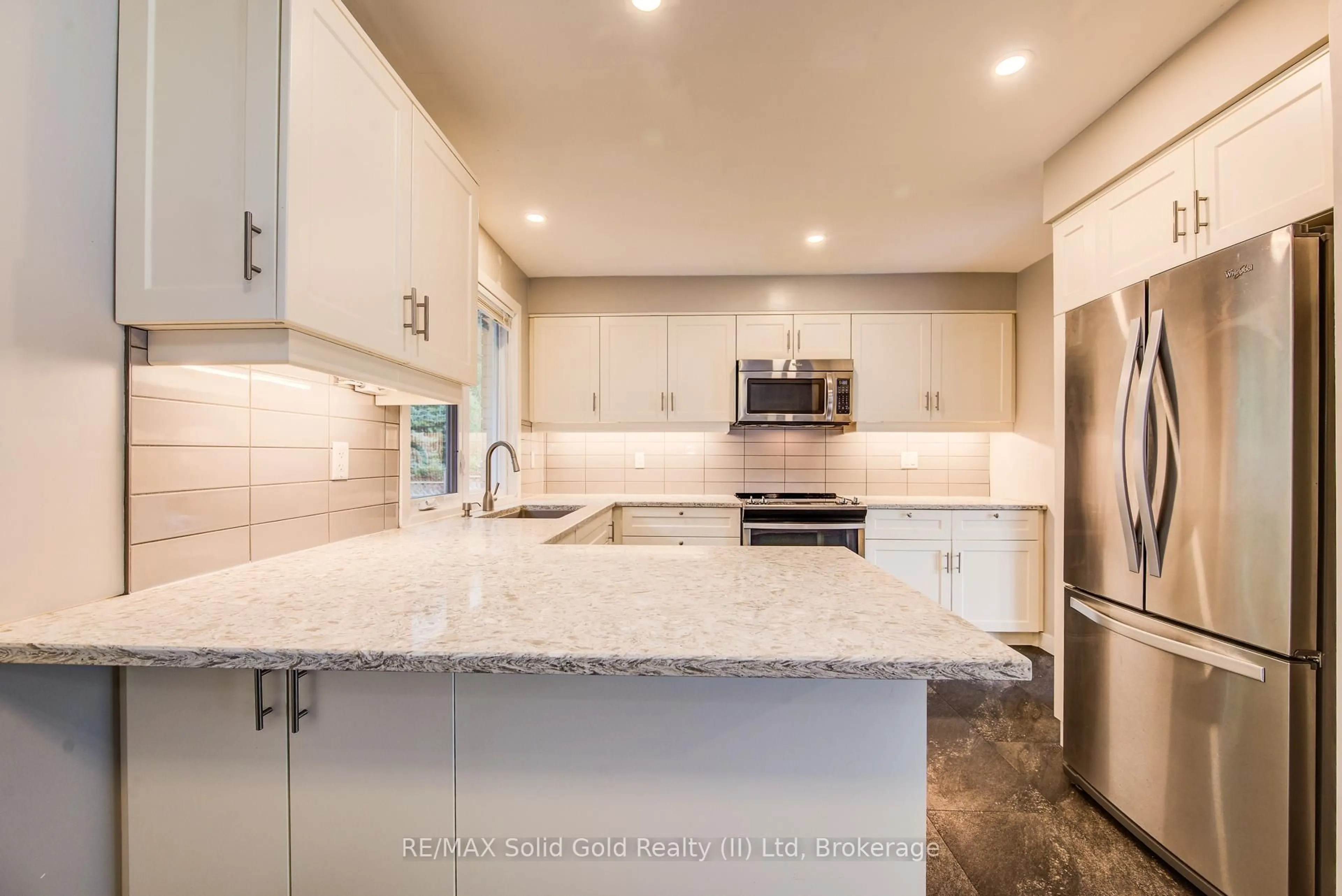 Open concept kitchen, ceramic/tile floor for 558 Sprucehill Ave, Waterloo Ontario N2L 4V7