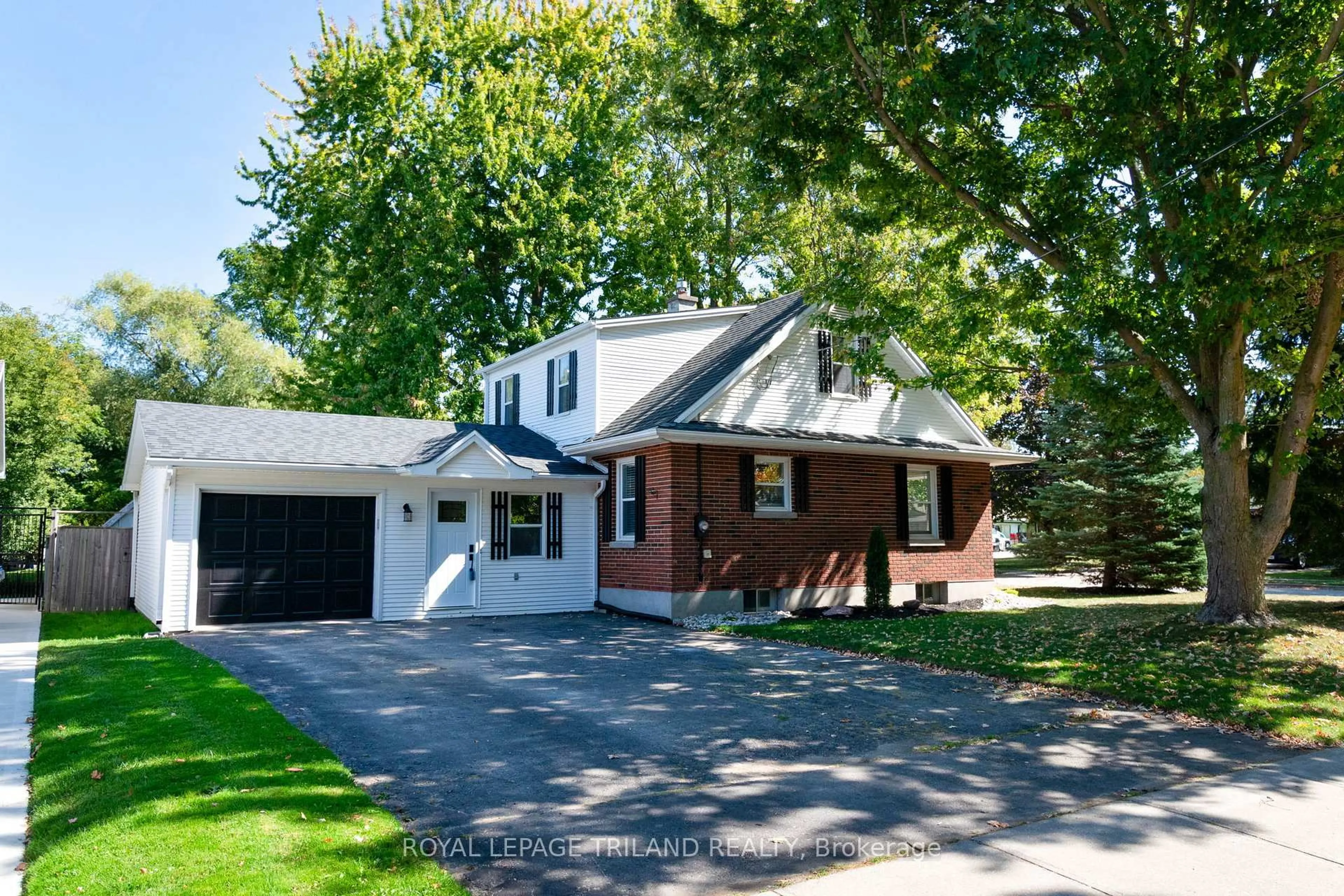 Home with brick exterior material, street for 130 Duchess Ave, Lucan Biddulph Ontario N0M 2J0
