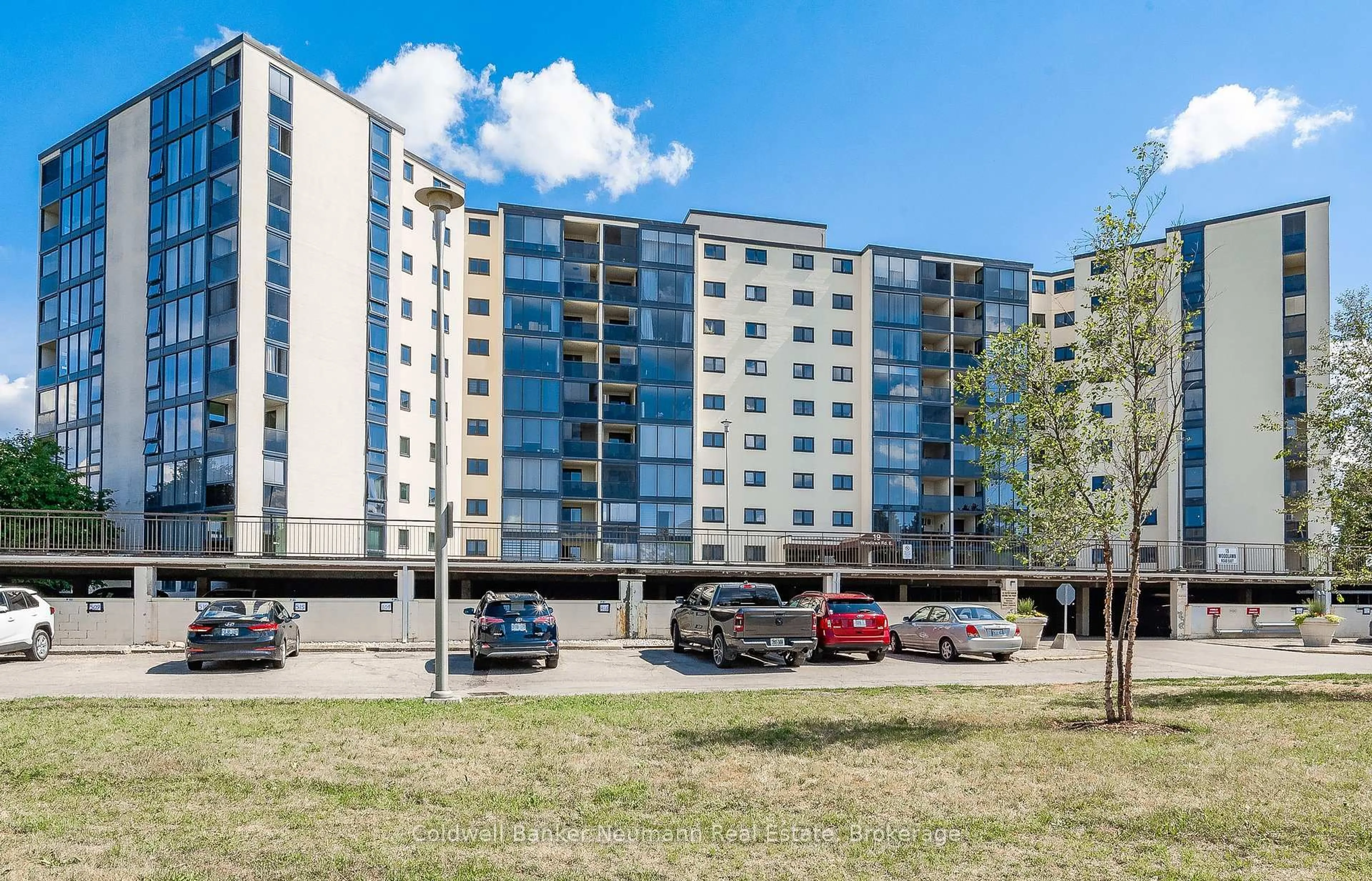 A pic from outside/outdoor area/front of a property/back of a property/a pic from drone, building for 19 Woodlawn Rd #303, Guelph Ontario N1H 7B1