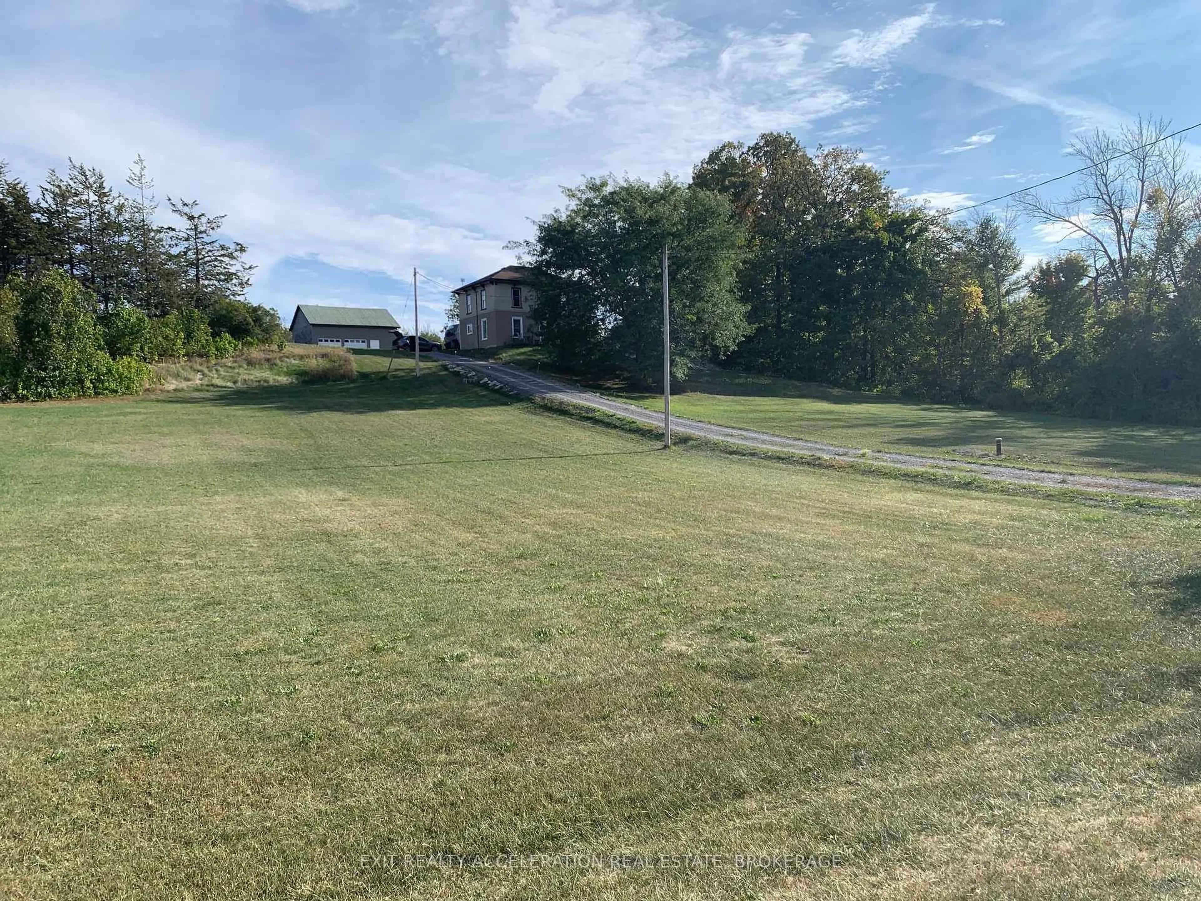 A pic from outside/outdoor area/front of a property/back of a property/a pic from drone, water/lake/river/ocean view for 1714 County Rd 9, Napanee Ontario K7R 3K8