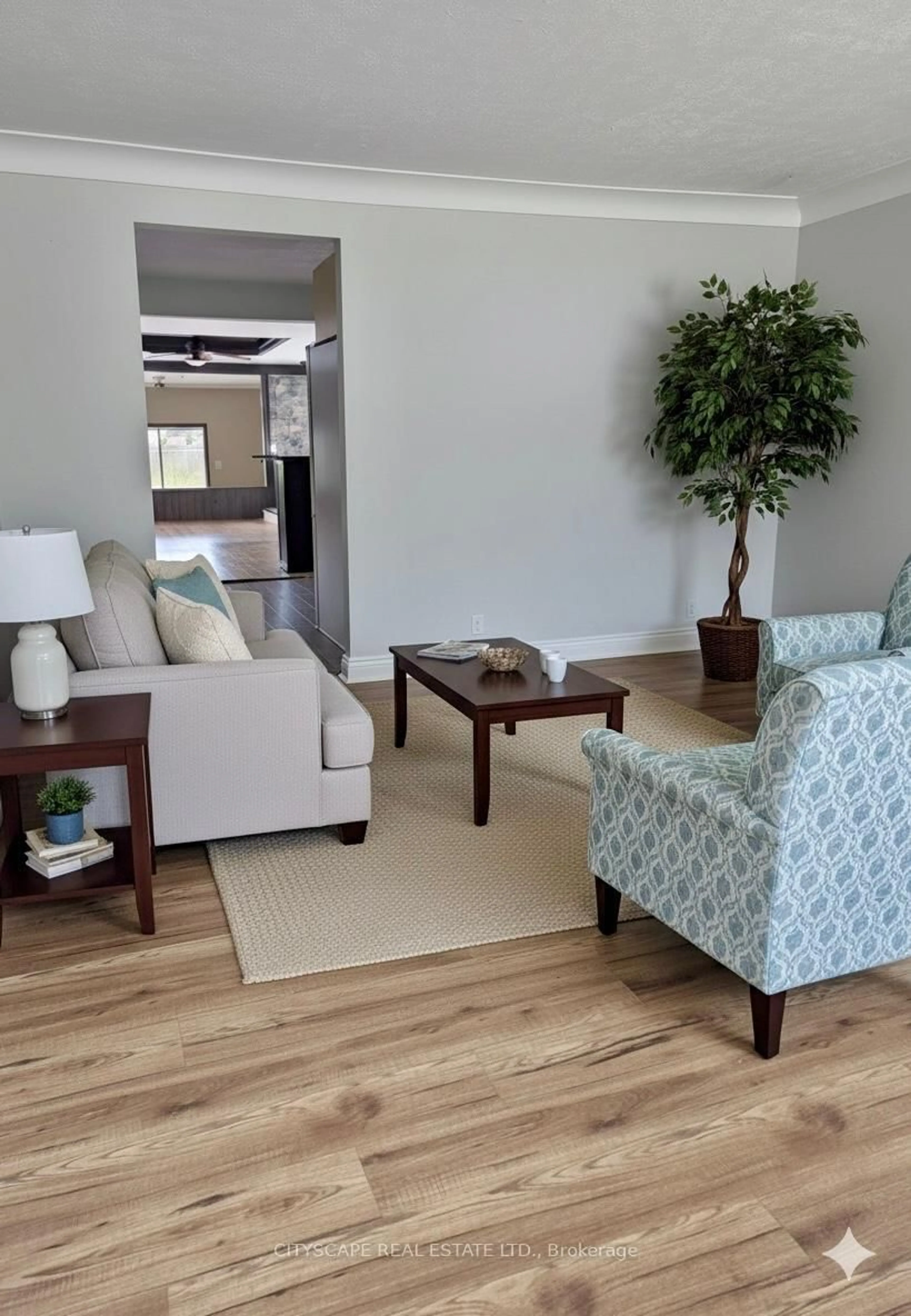 Living room with furniture, wood/laminate floor for 1650 Glendale Ave, Windsor Ontario N8T 2N2